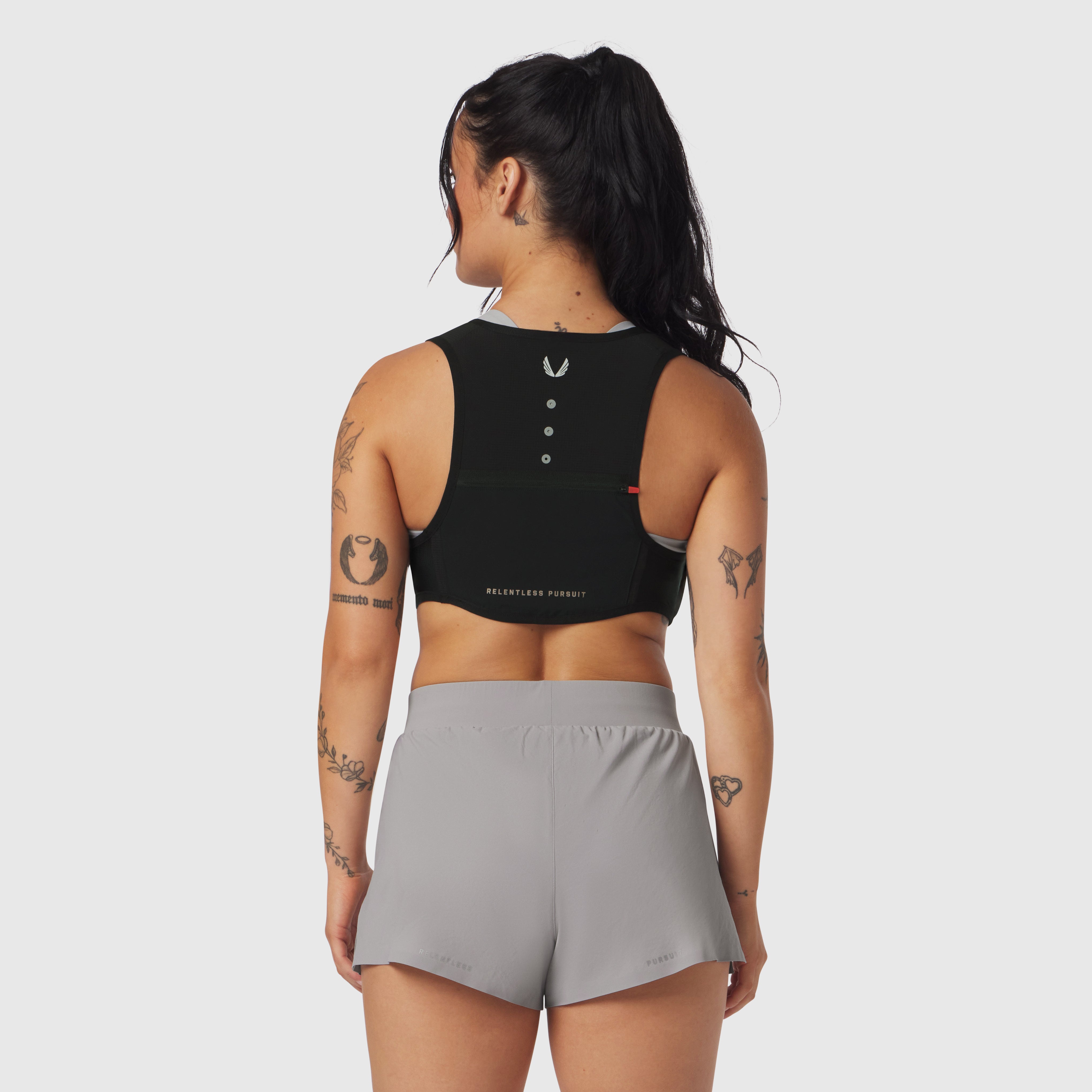 1080 Run Pack sports bra in black, back view on model