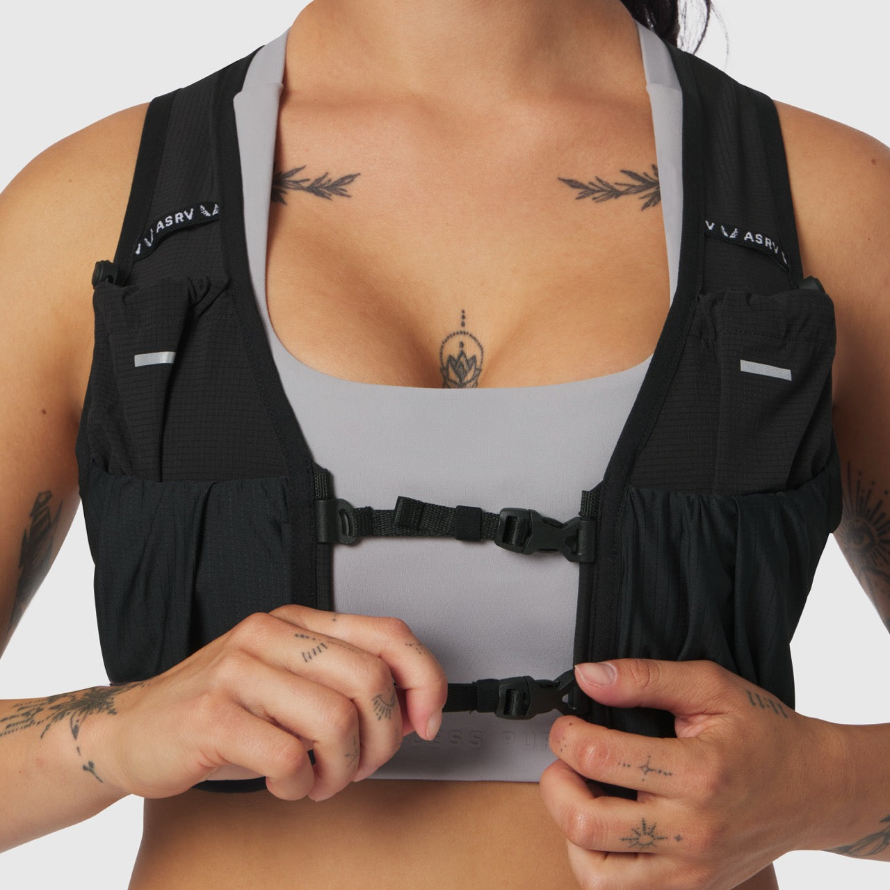 1080 Run Pack in black, front view worn by model