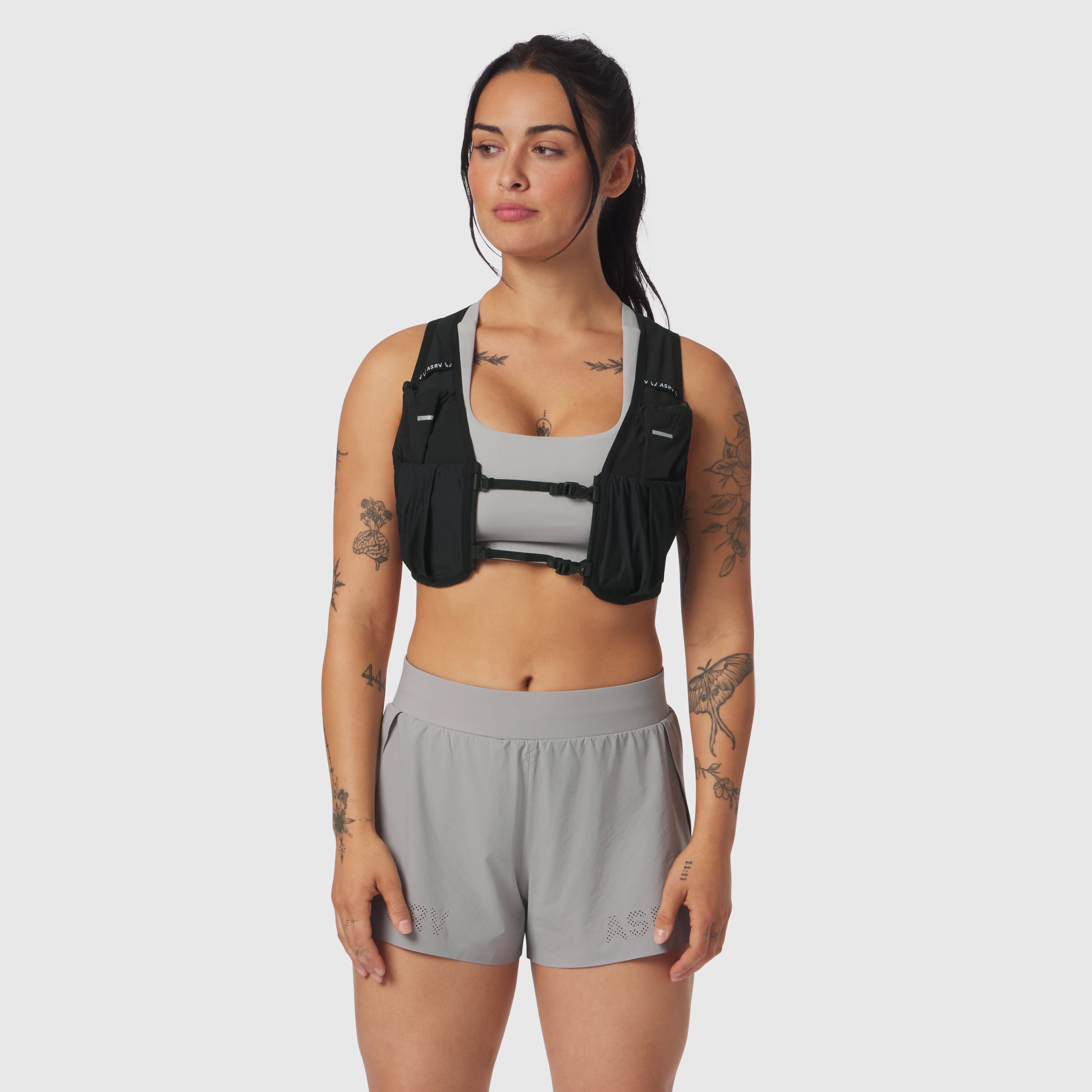 1080 Run Pack in black, worn by model, front view