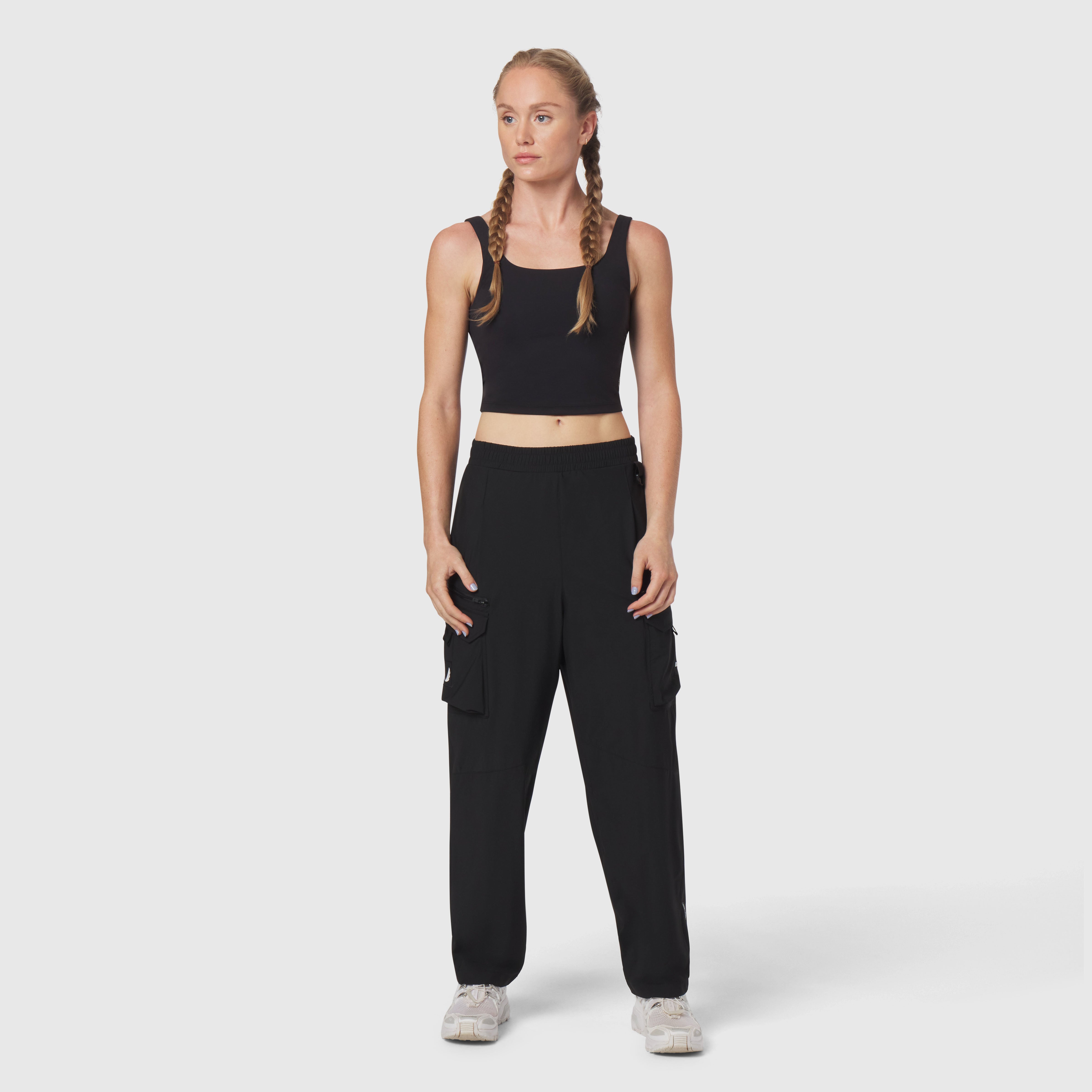 Tetra-Lite® Cargo City Pant in black, worn by model standing against white background
