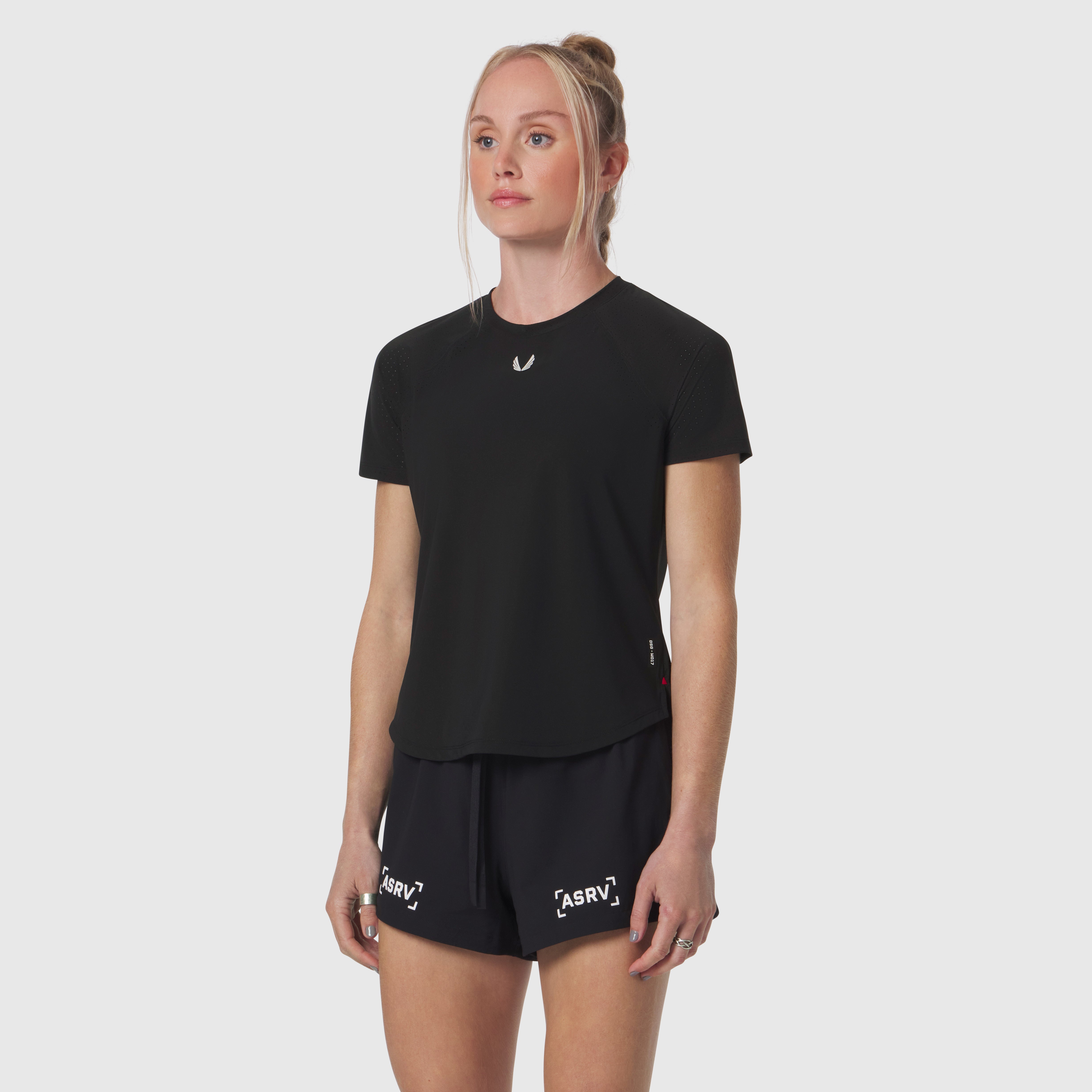 Black Laser-Vent Established Tee worn by model with matching black shorts, front view