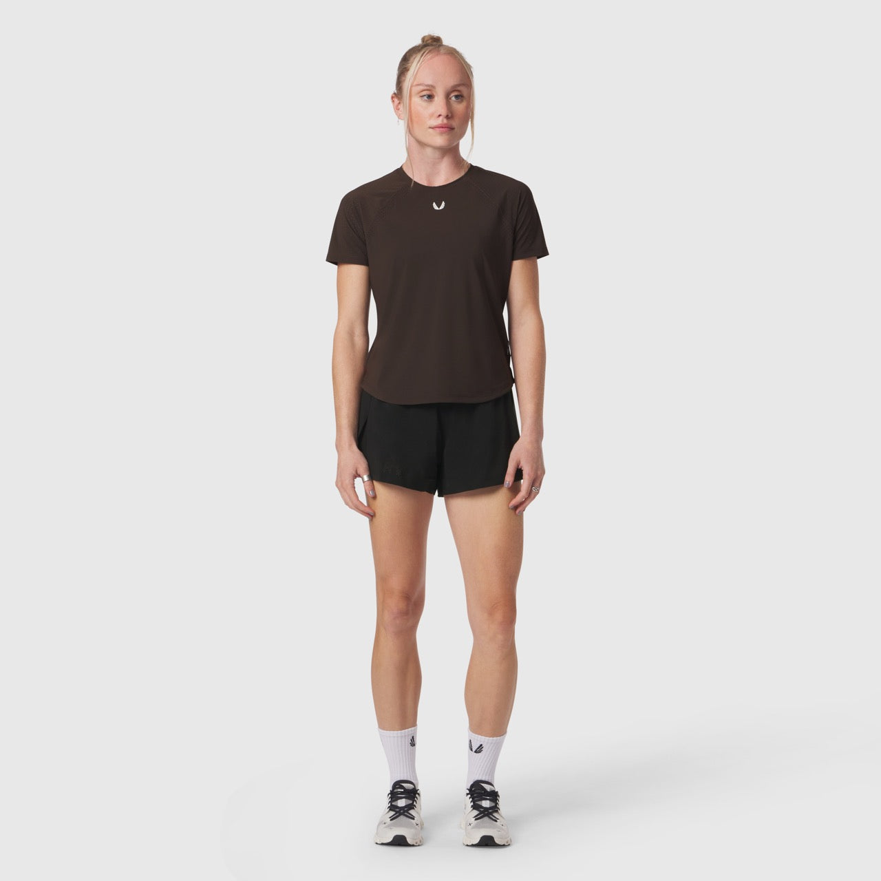W017 Laser-Vent Established Tee in dark earth, worn with black shorts, front view on model