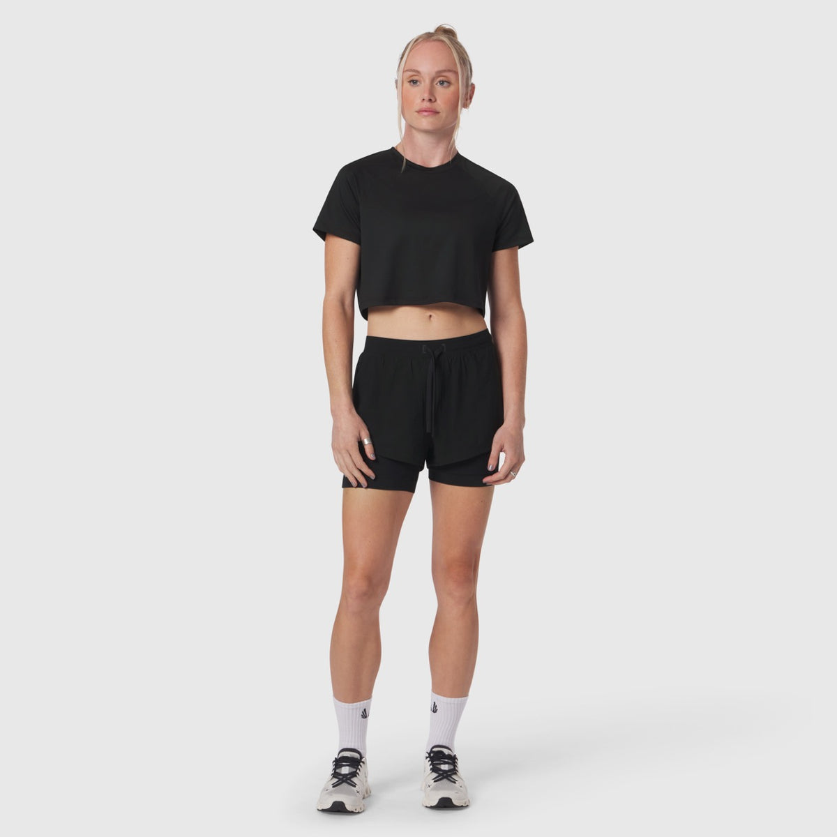Black AeroSilver cropped tee worn with black shorts and white socks, front view