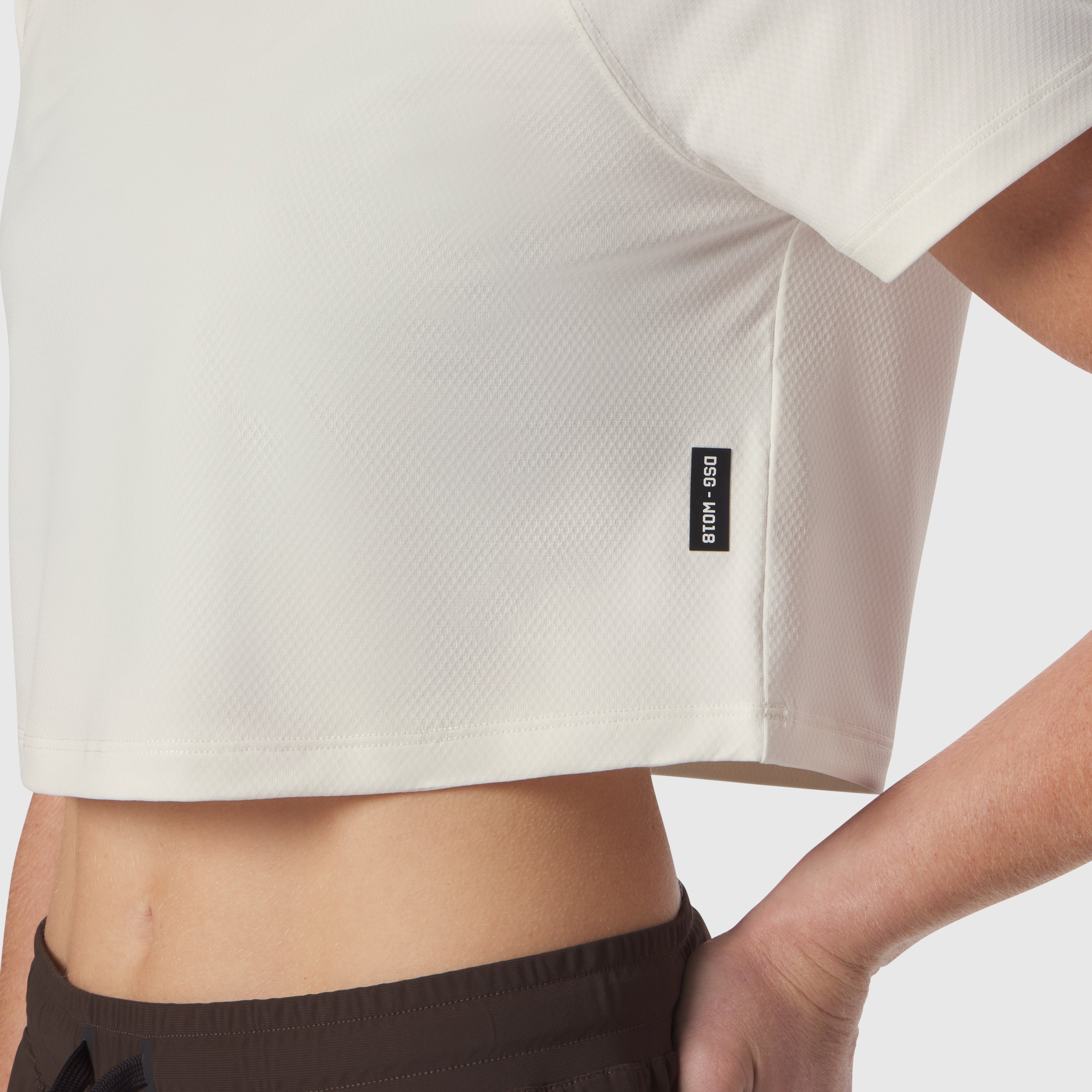 AeroSilver® Cropped Tee in ivory cream worn by model, front detail view