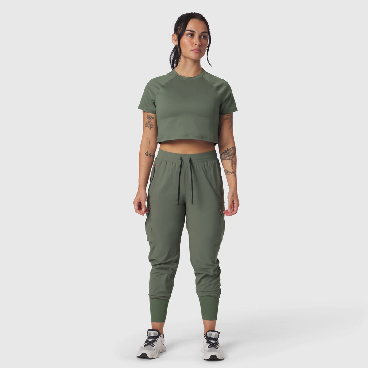 AeroSilver® Cropped Tee in sage worn with matching cargo joggers, front view