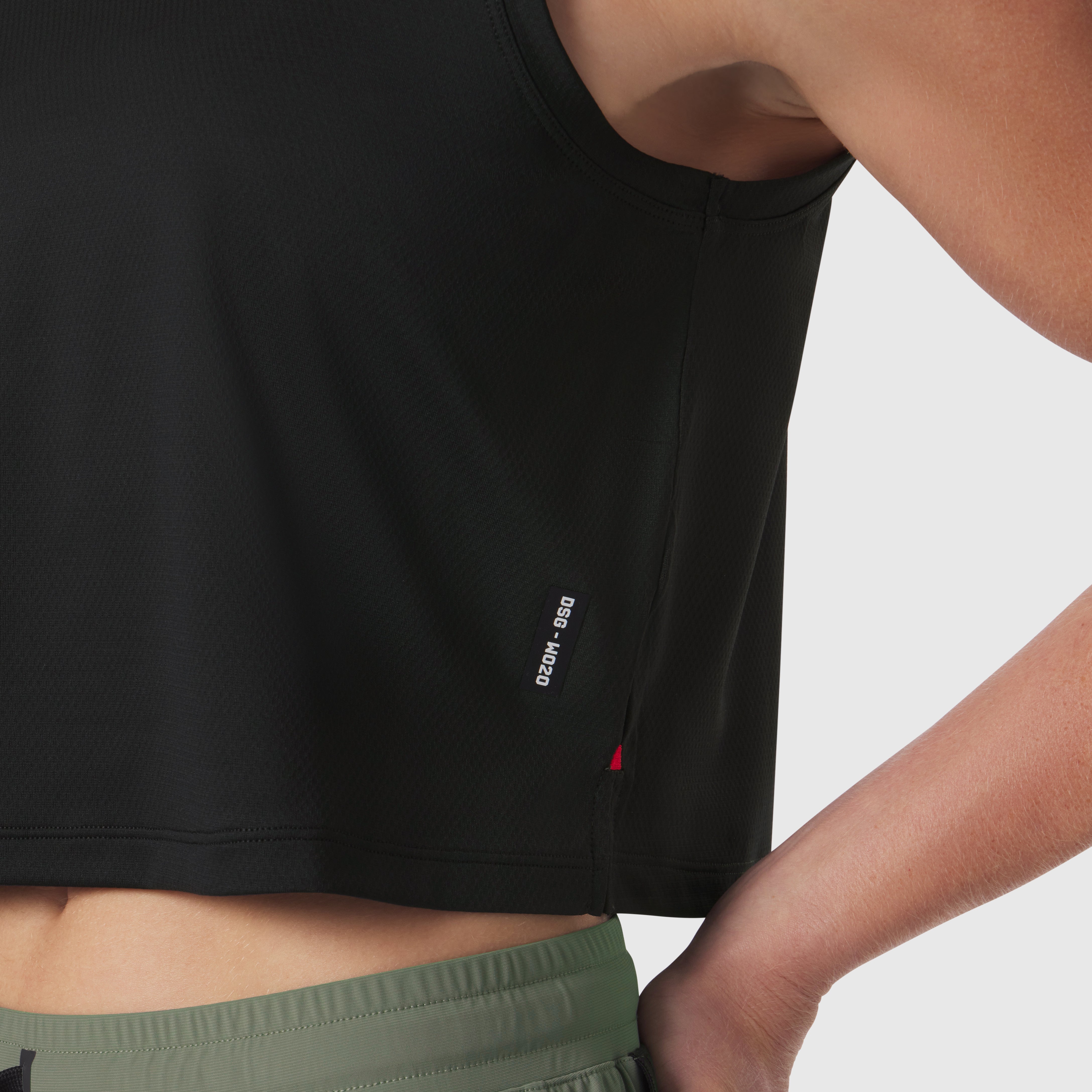 AeroSilver Tank Top in black worn by model, side detail view showing branding
