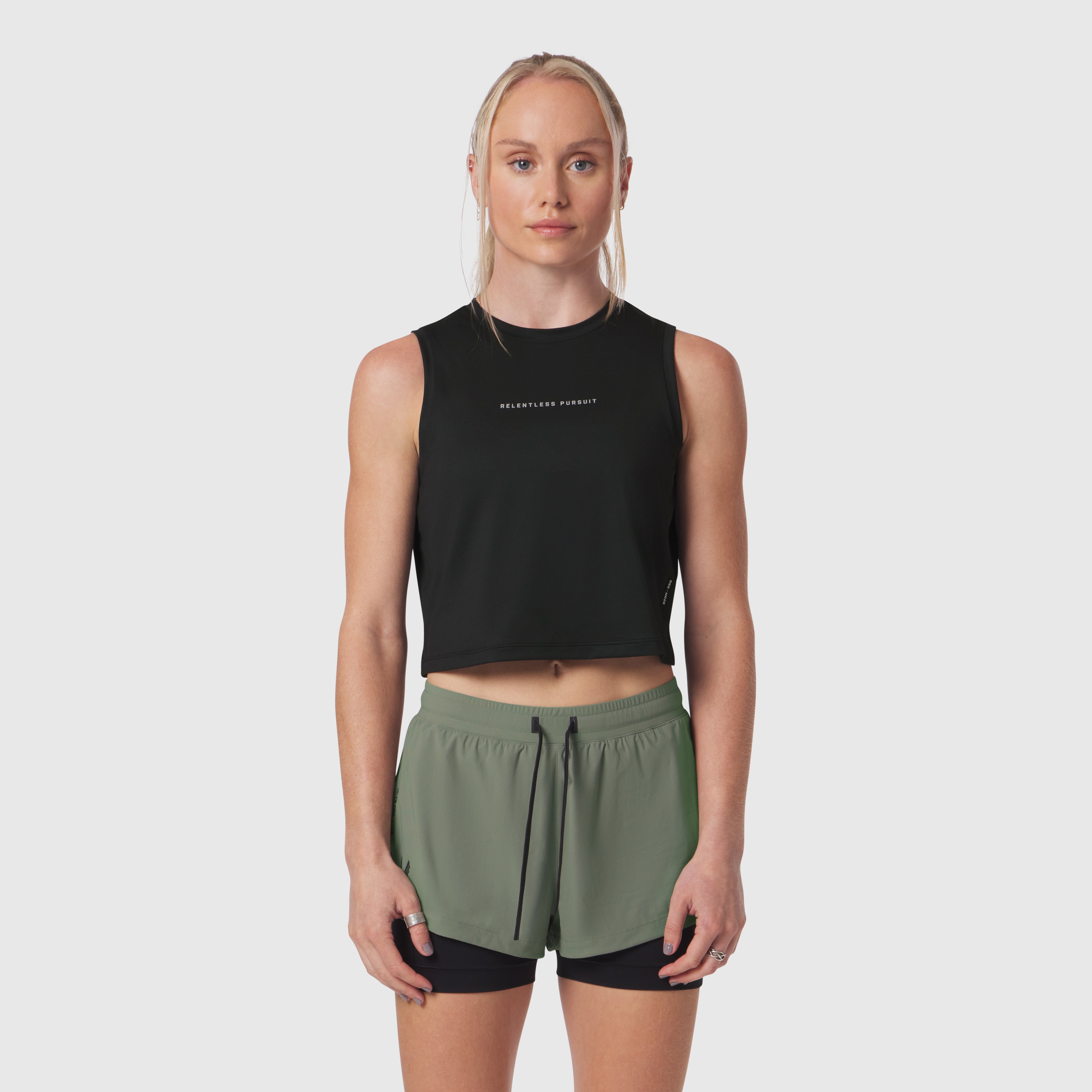 Black AeroSilver tank top with 'RP' text worn with sage green shorts, front view
