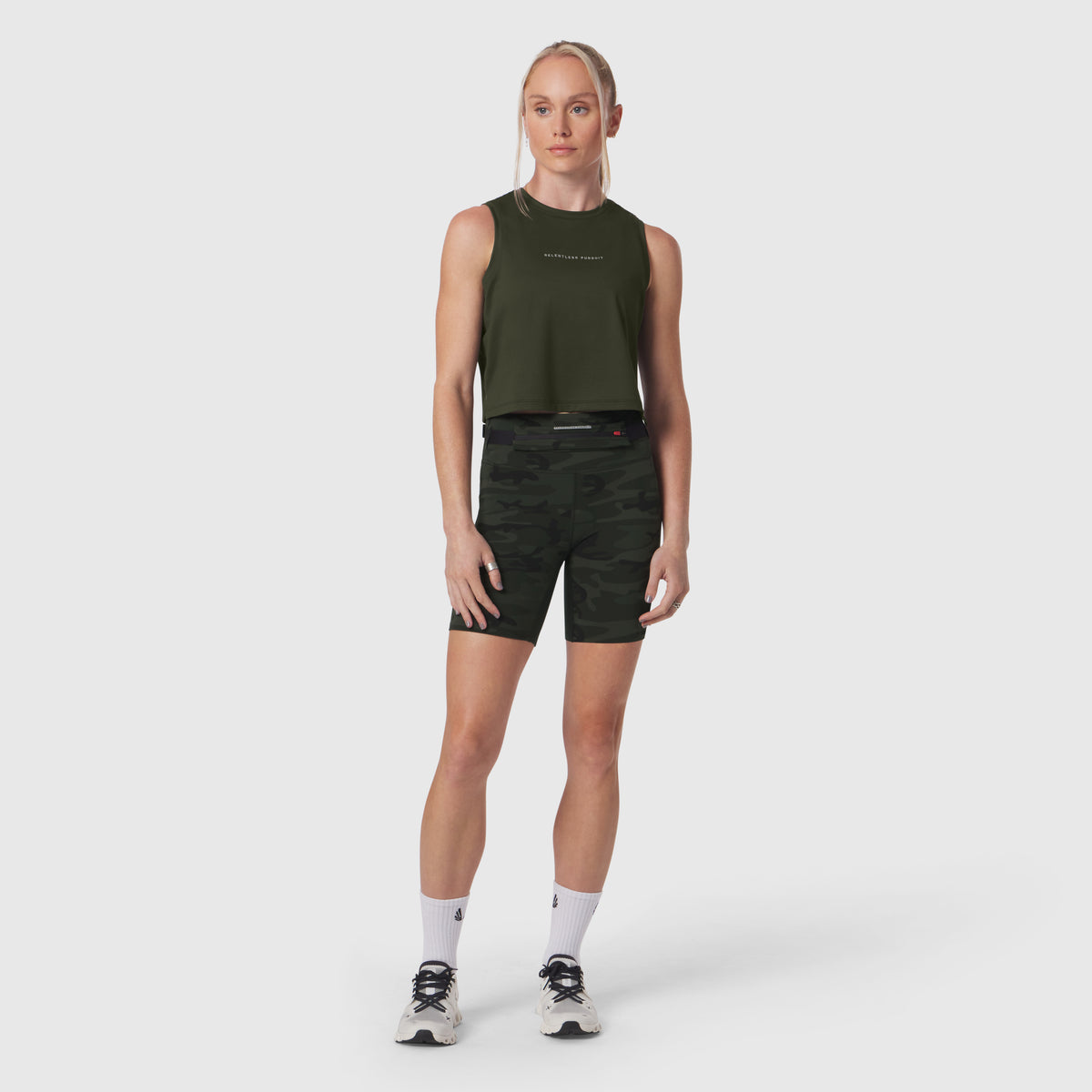 AeroSilver® tank top in olive worn with black camo shorts, front view