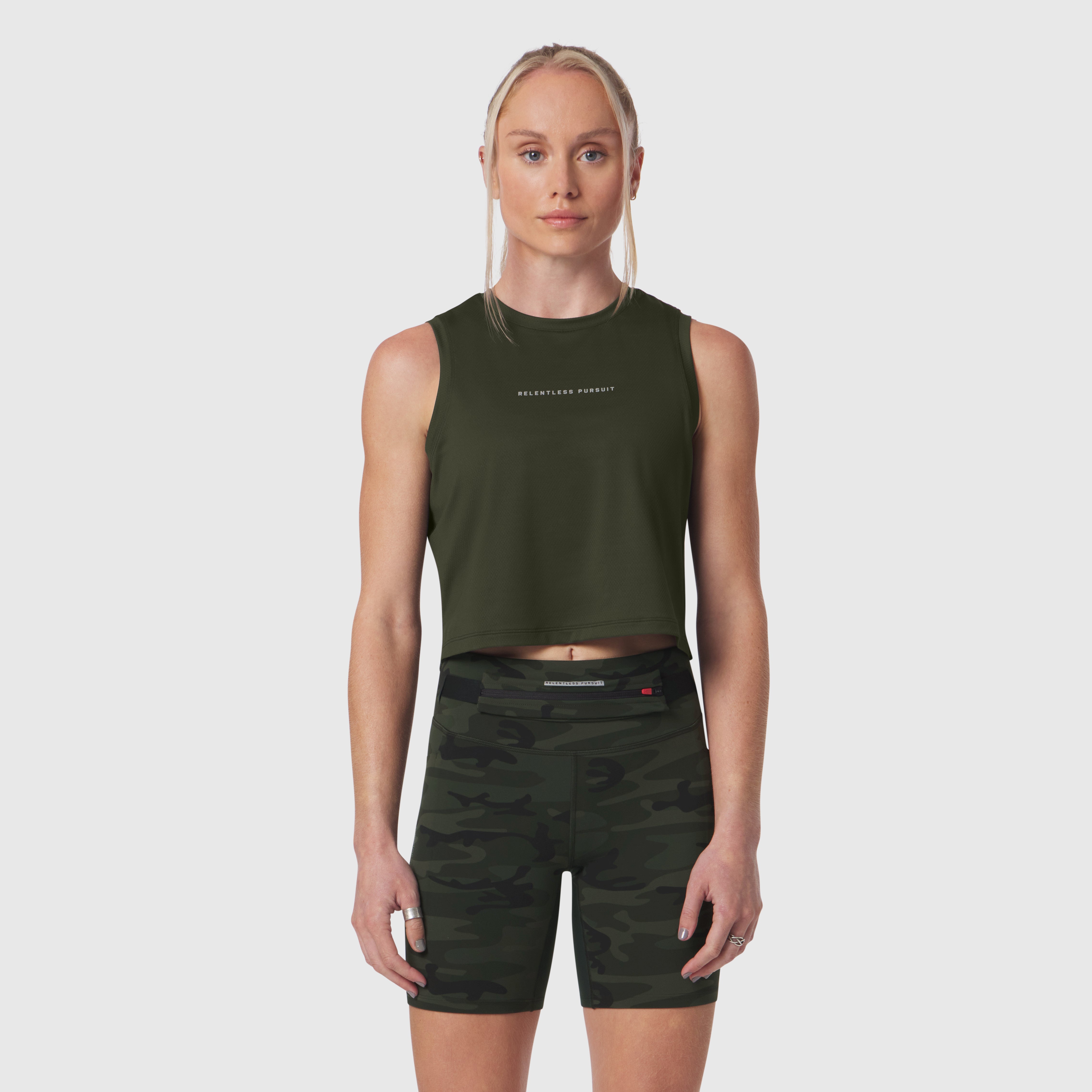 AeroSilver® cropped tank top in olive with camo shorts, front view on model