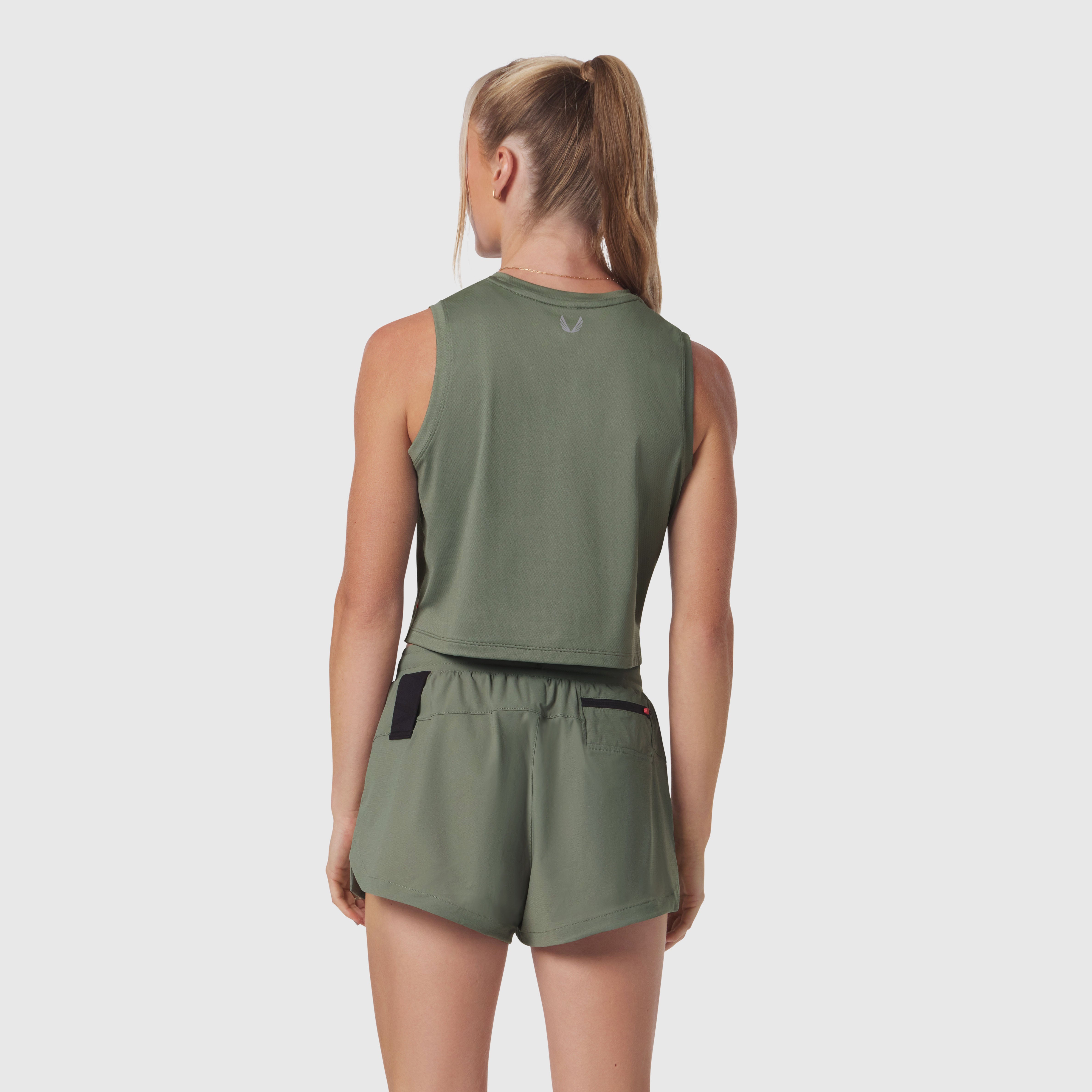 AeroSilver® Tank Top in sage, worn from back view with matching shorts