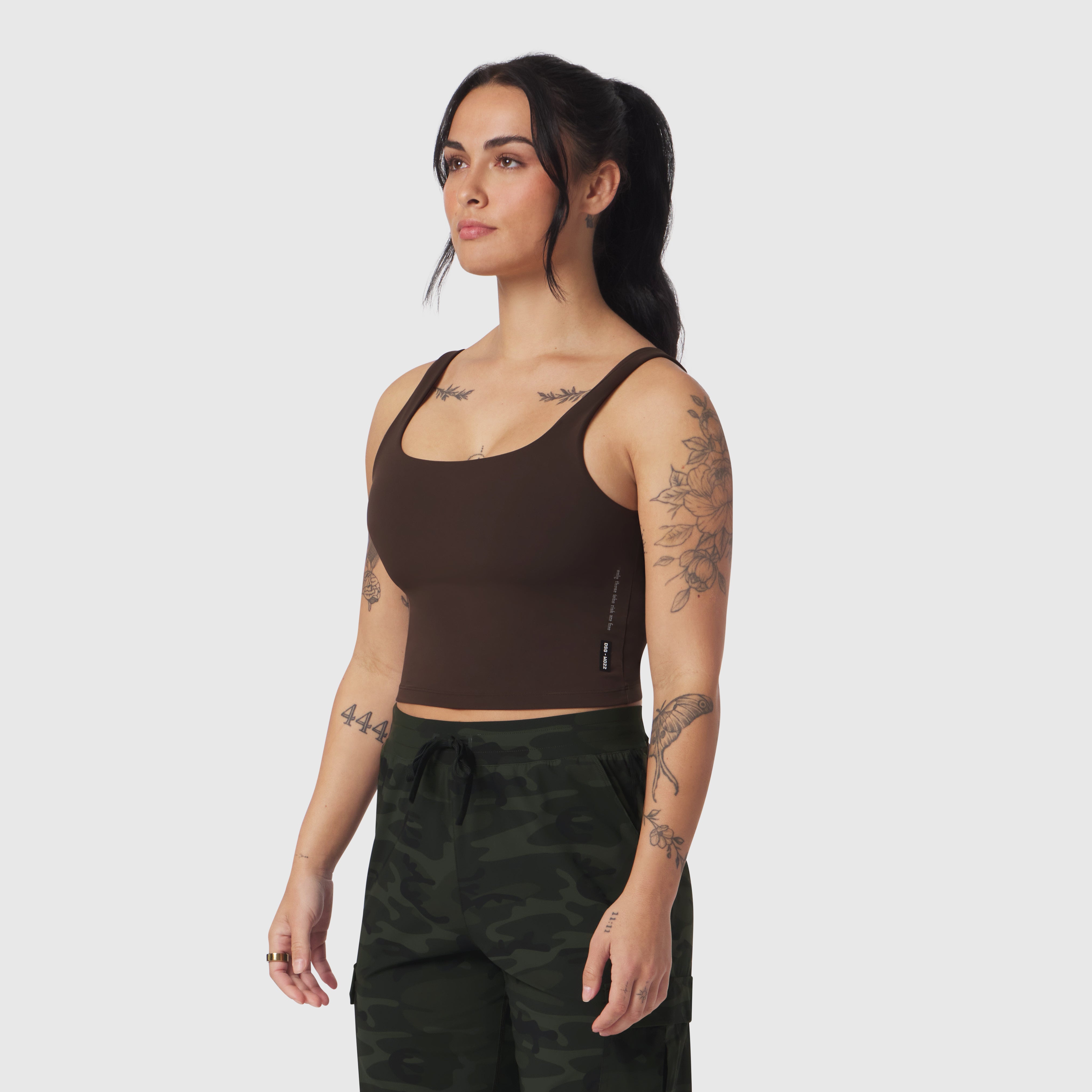 Dark brown LYCRA® 2-in-1 tank top worn by model, front side view