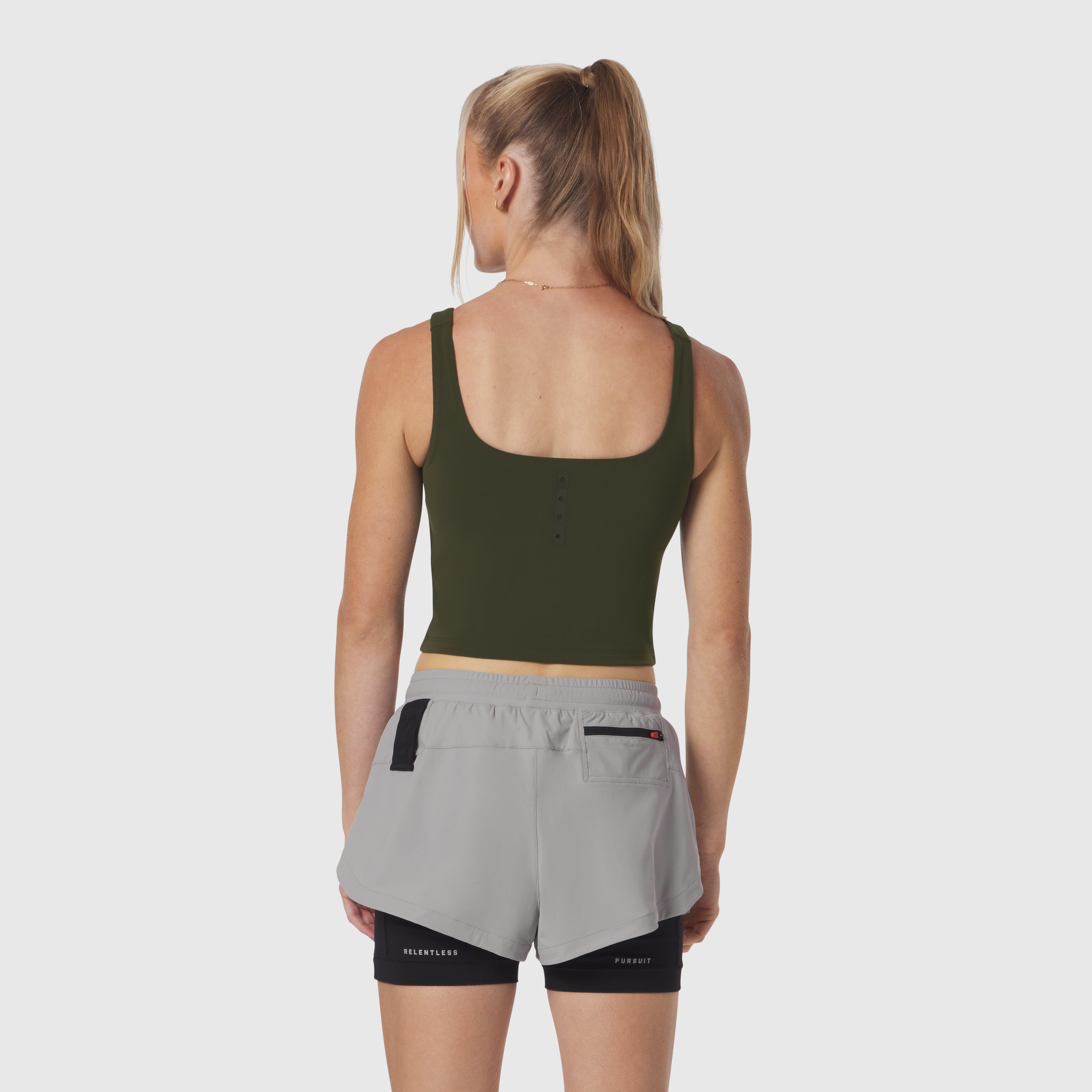 W022 Lycra 2-in-1 Tank Top in olive, back view on model