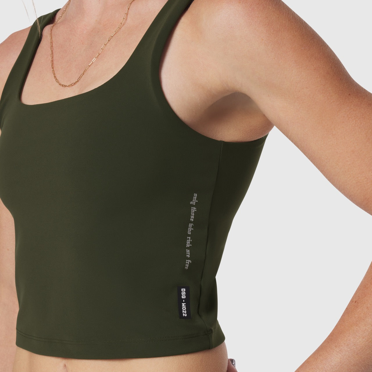 W022 Lycra 2-in-1 tank top in olive, worn by model, front view