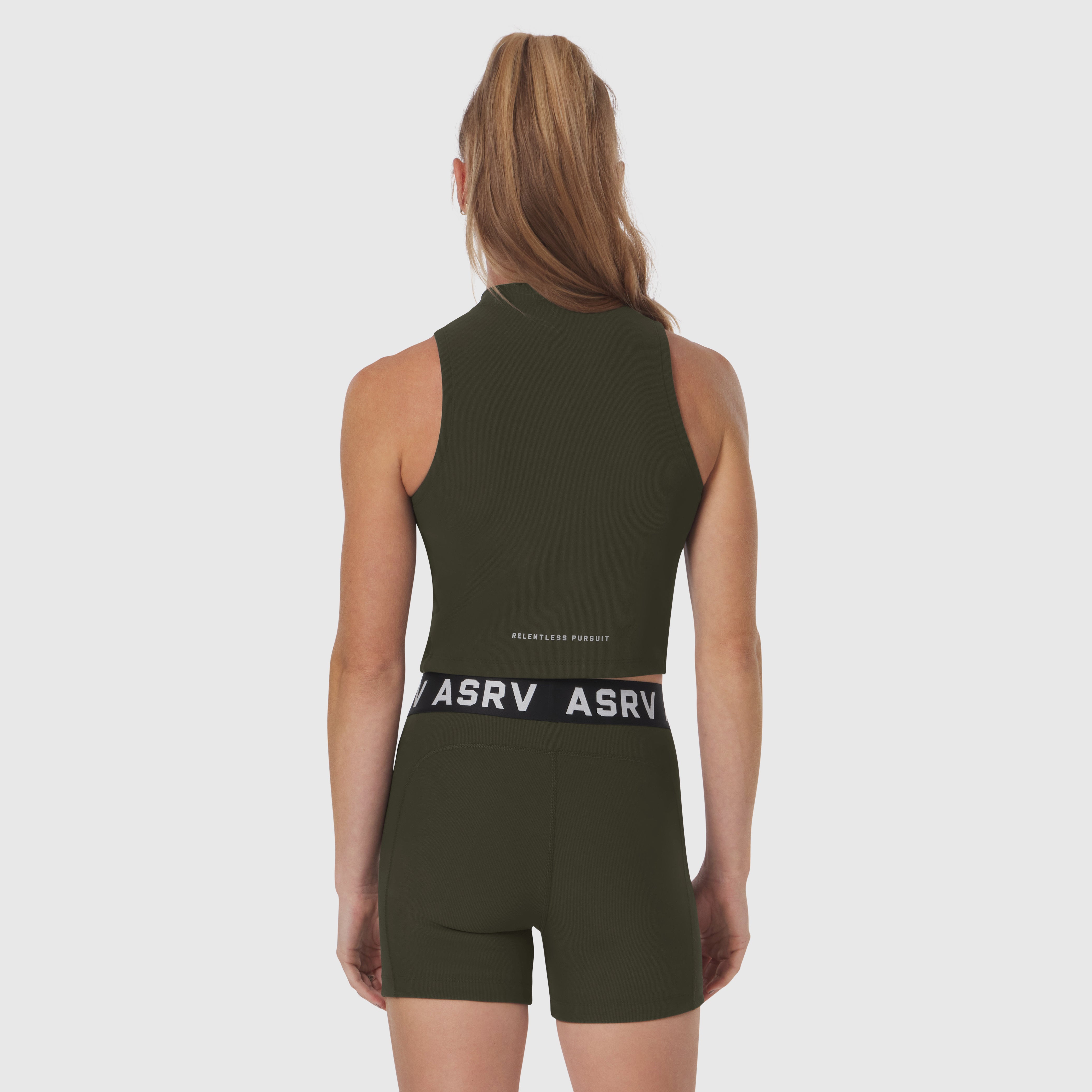 W023 Lycra Ribbed Mockneck Tank in olive worn by model, back view
