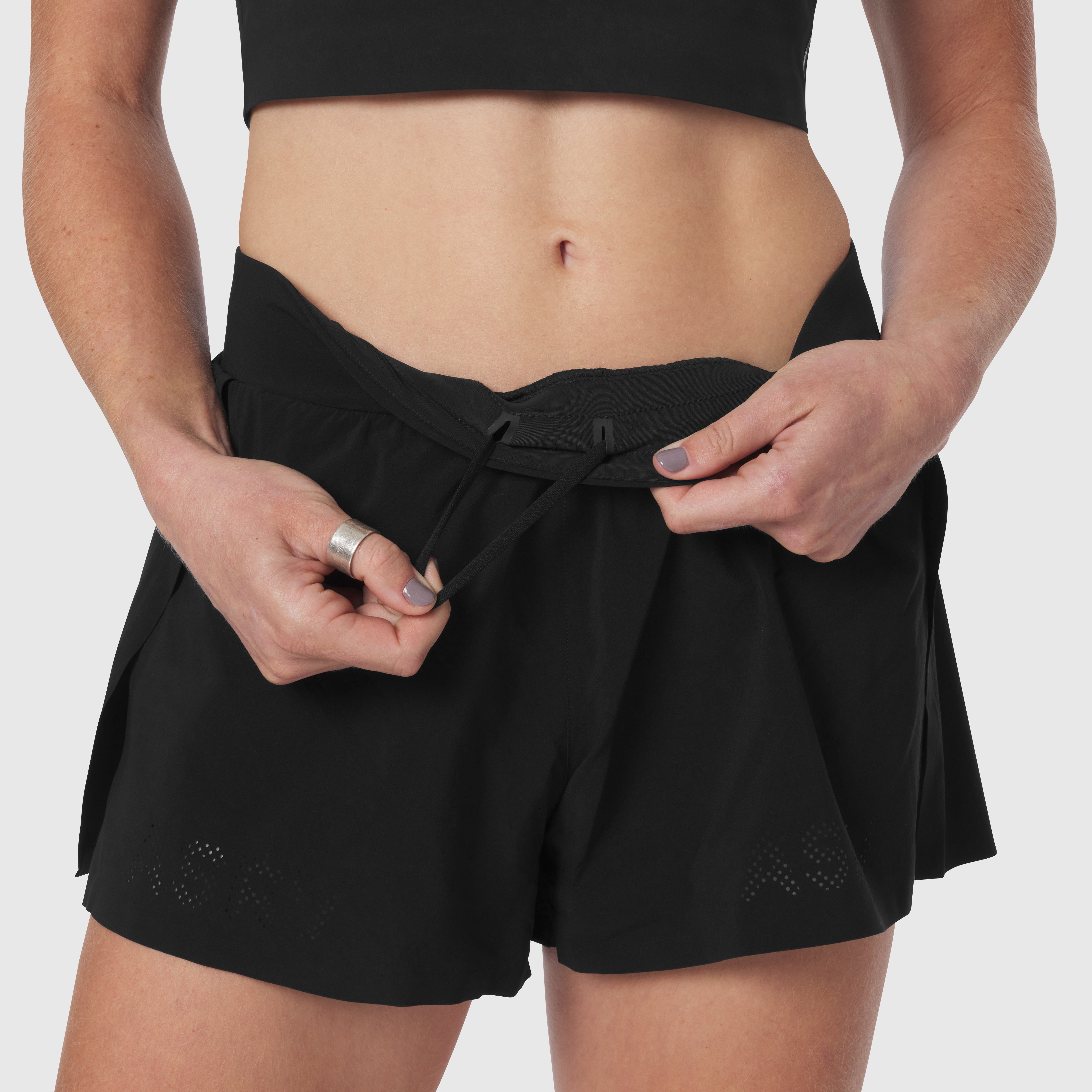 Aerotex™ Side Split Run Short in black worn by model, front view