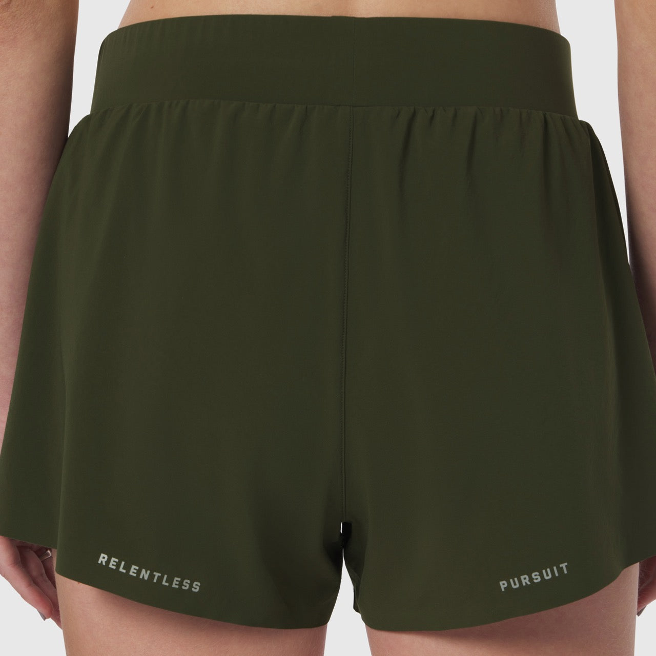 Aerotex Side Split Run Short in olive, back view on model