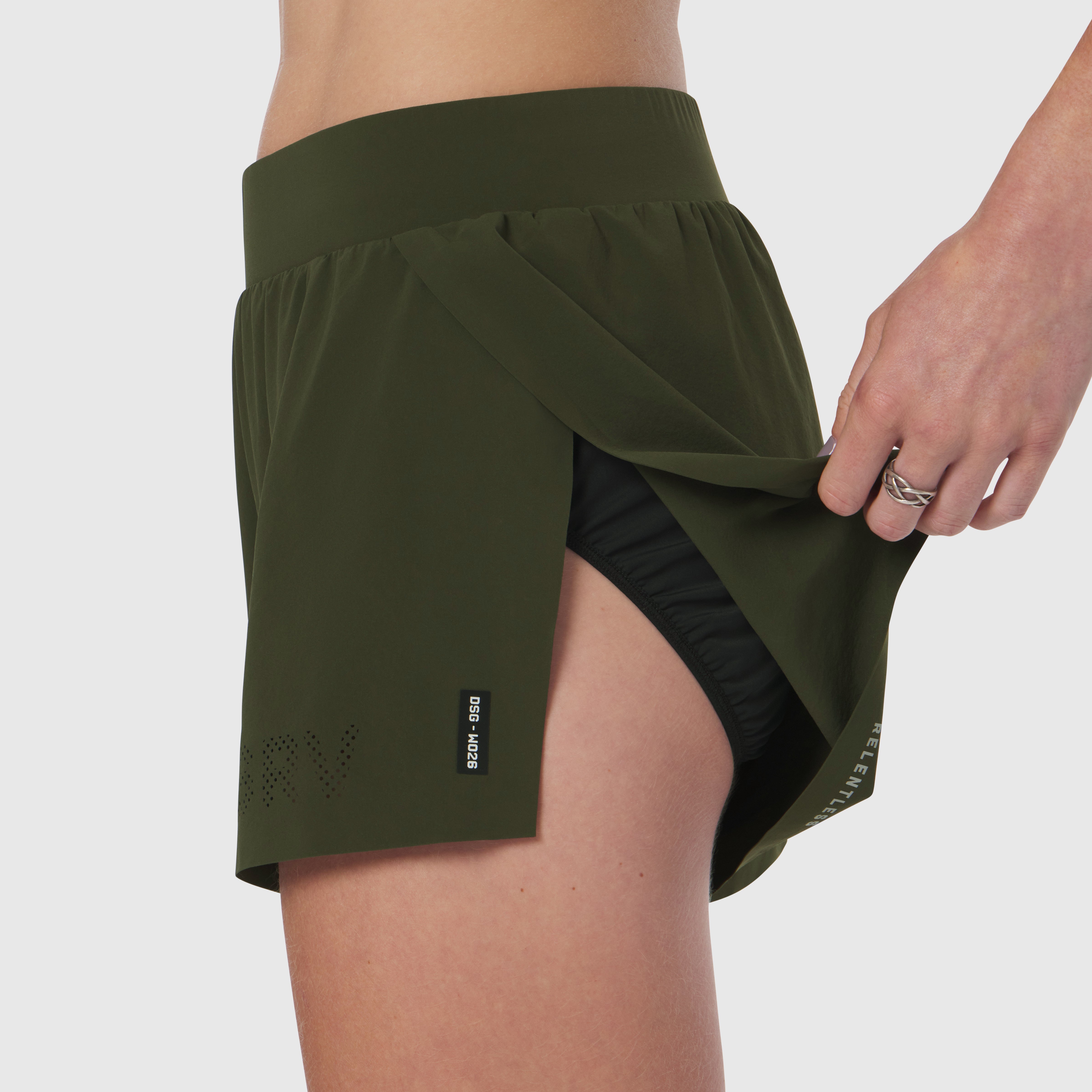 Aerotex Side Split Run Short in olive, worn by model showing side pocket detail