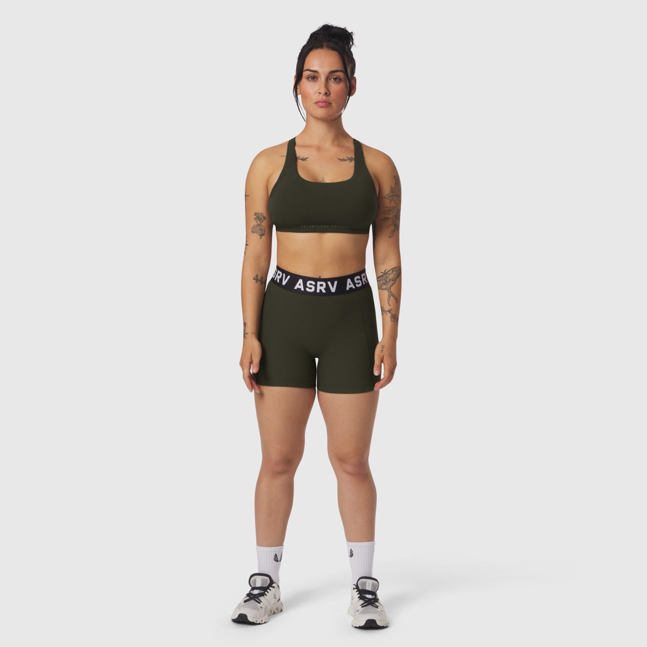 W027 Lycra Ribbed Short in dark earth, worn with matching sports bra, front view on model