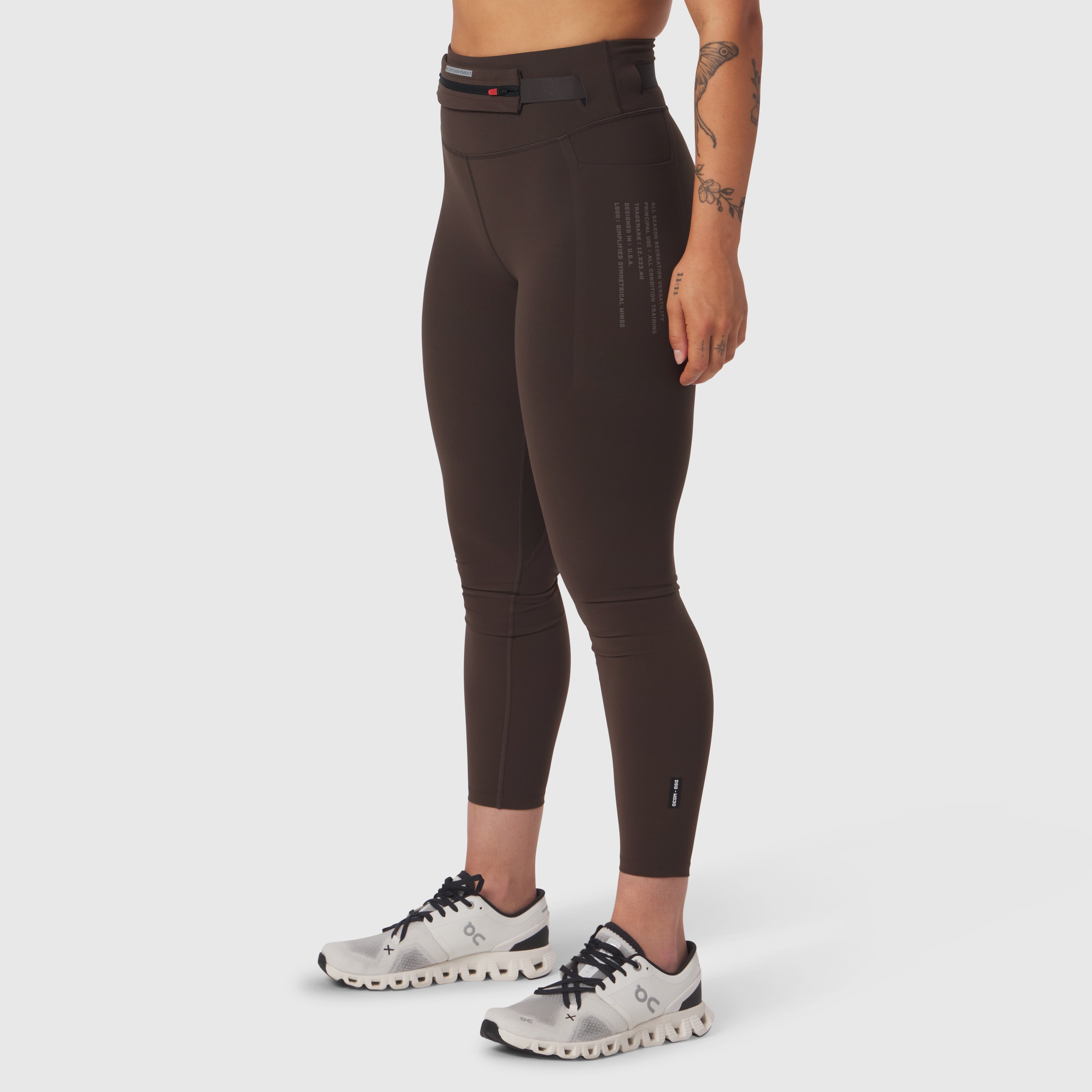 W030 LYCRA® 3-in-1 Legging in Dark Earth, modeled from side, cropped length