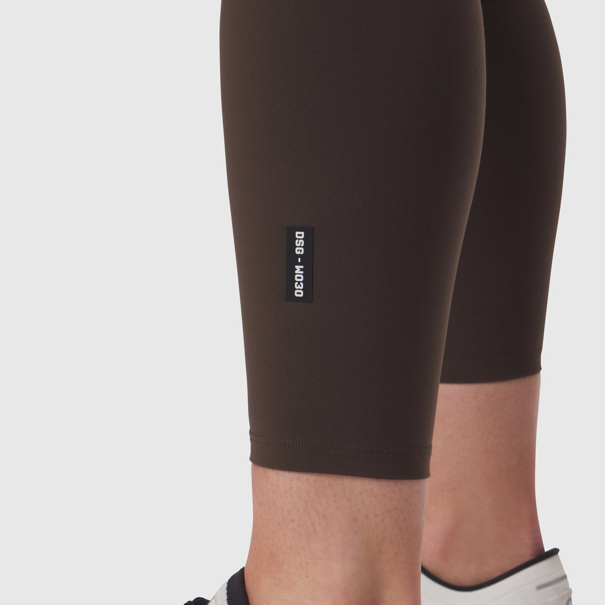 W030 LYCRA 3-in-1 Legging in Dark Earth, worn on model, side view
