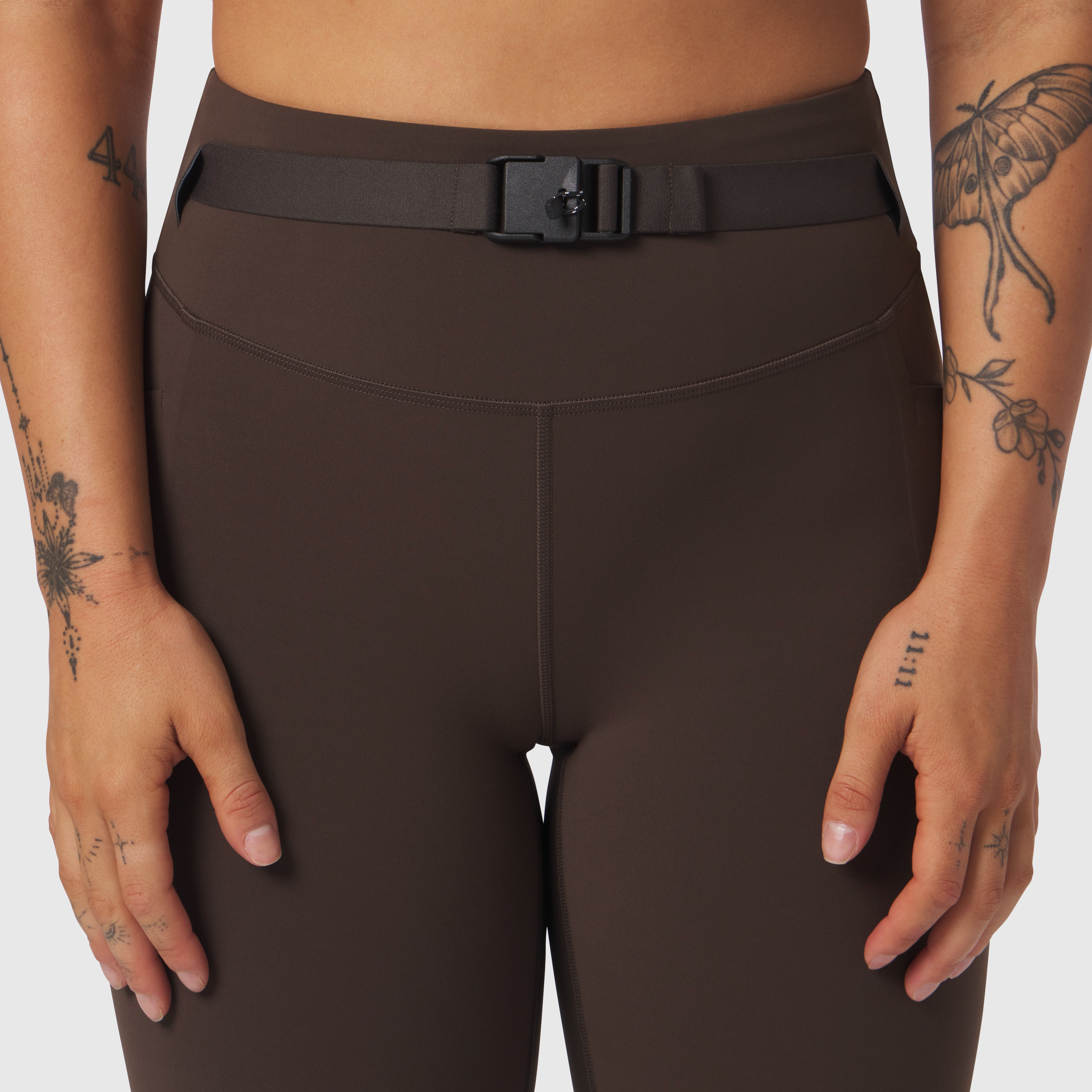 LYCRA® 3-in-1 Legging in Dark Earth worn by model, front waist detail with belt