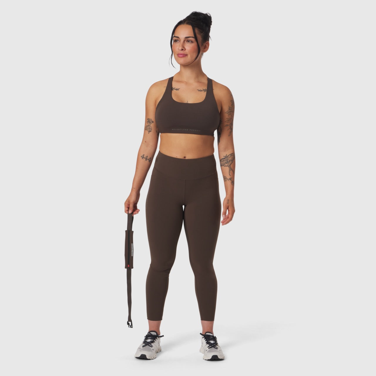 W030 LYCRA® 3-in-1 Legging in Dark Earth, model wearing full-length view with jump rope