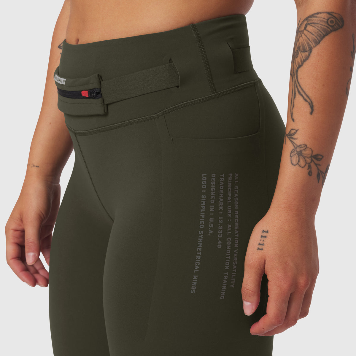 W030 LYCRA 3-in-1 Legging in olive worn by model, side view detail