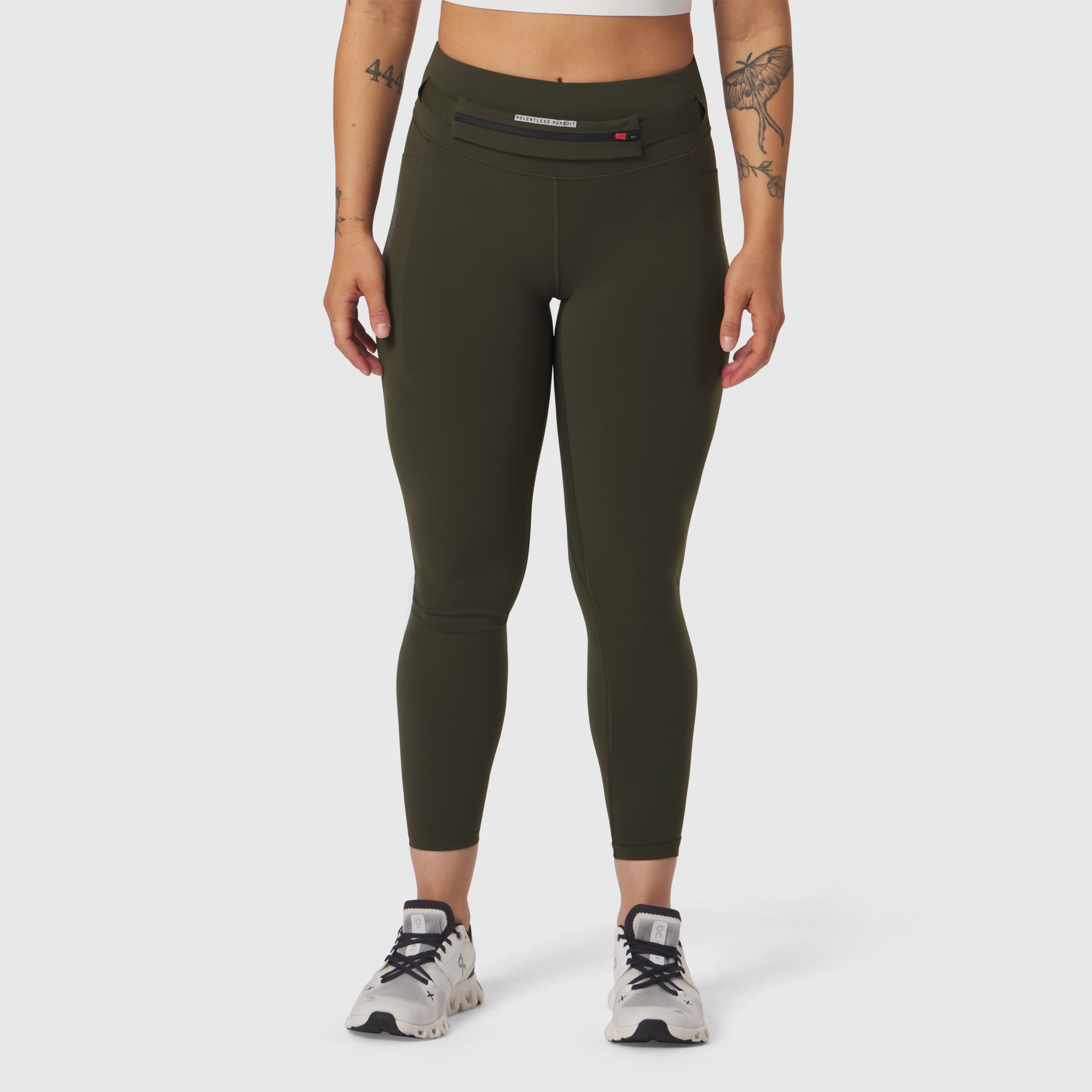 W030 LYCRA® 3-in-1 Legging in olive, worn by model, front view