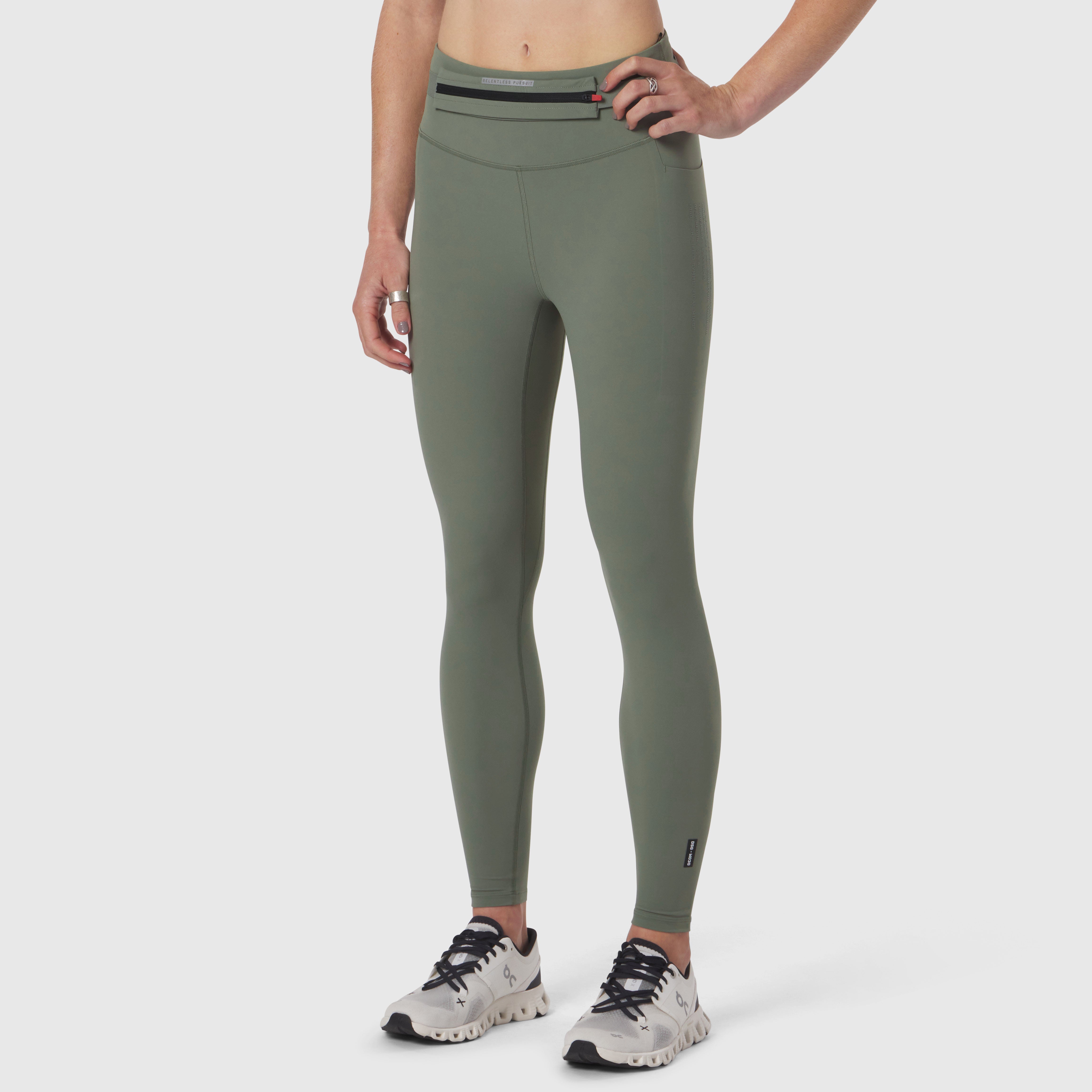 W030 LYCRA® 3-in-1 Legging in sage, worn with sneakers, front view