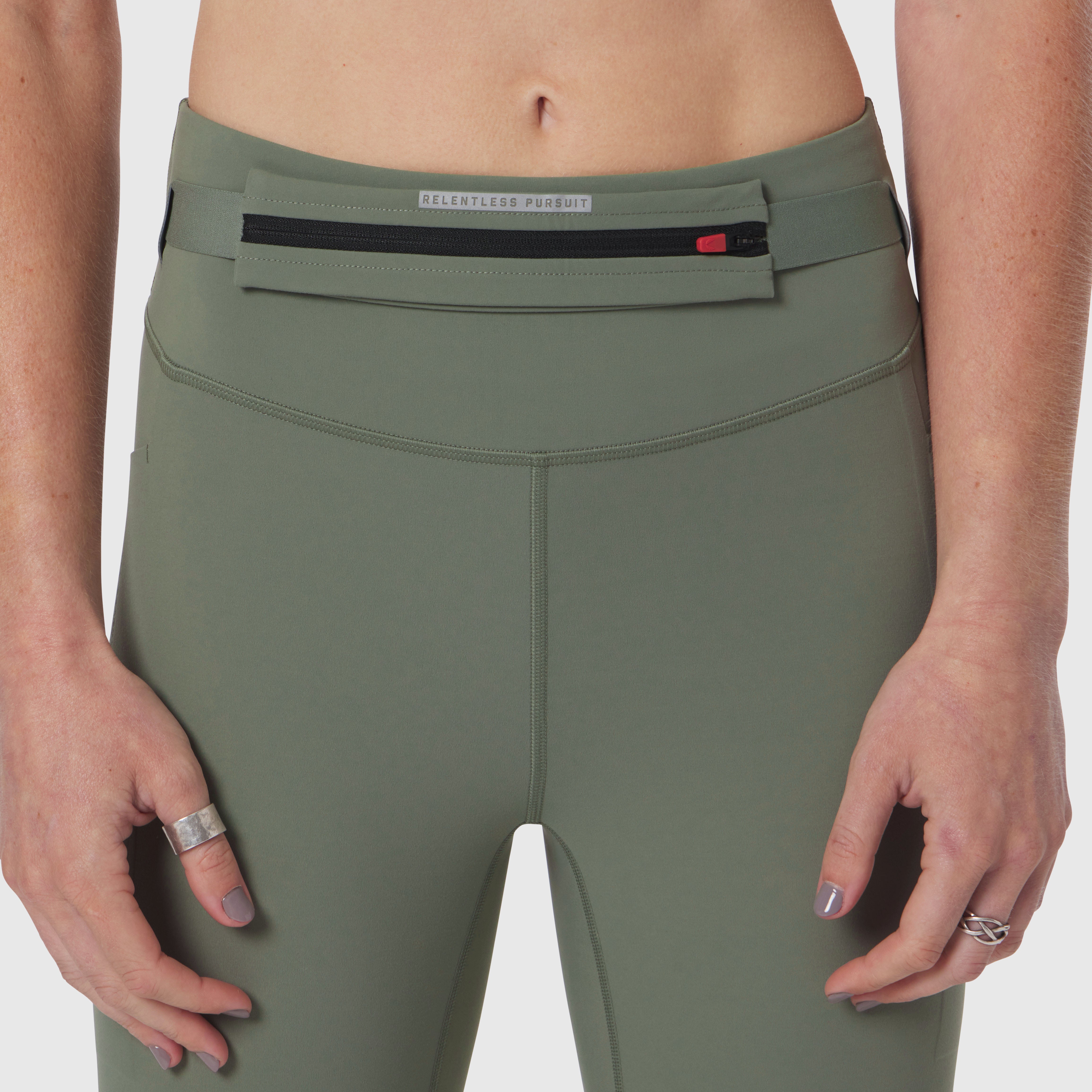 W030 LYCRA 3-in-1 Legging in sage, worn by model from waist down, front view