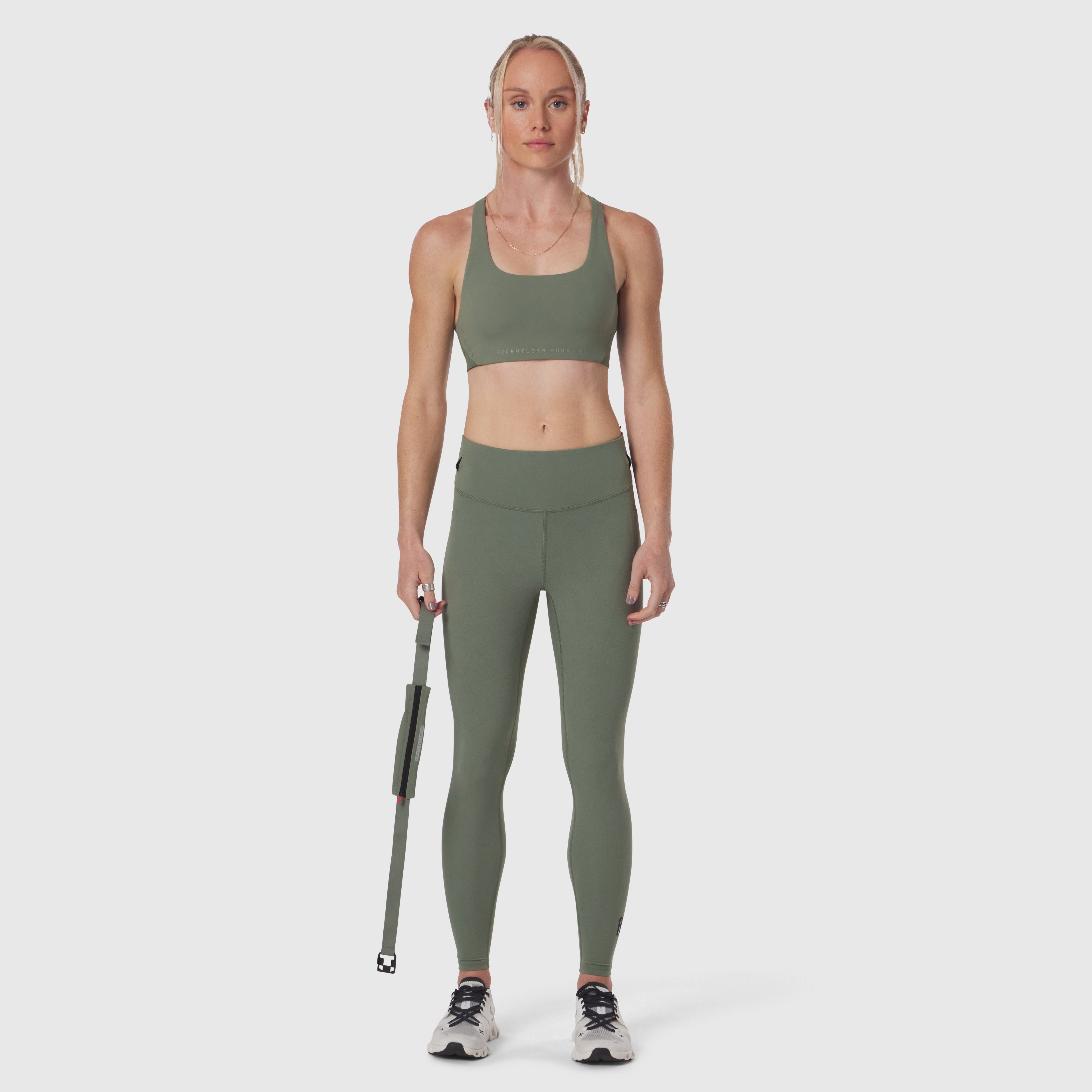 W030 LYCRA® 3-in-1 Legging in sage, model wearing full outfit front view