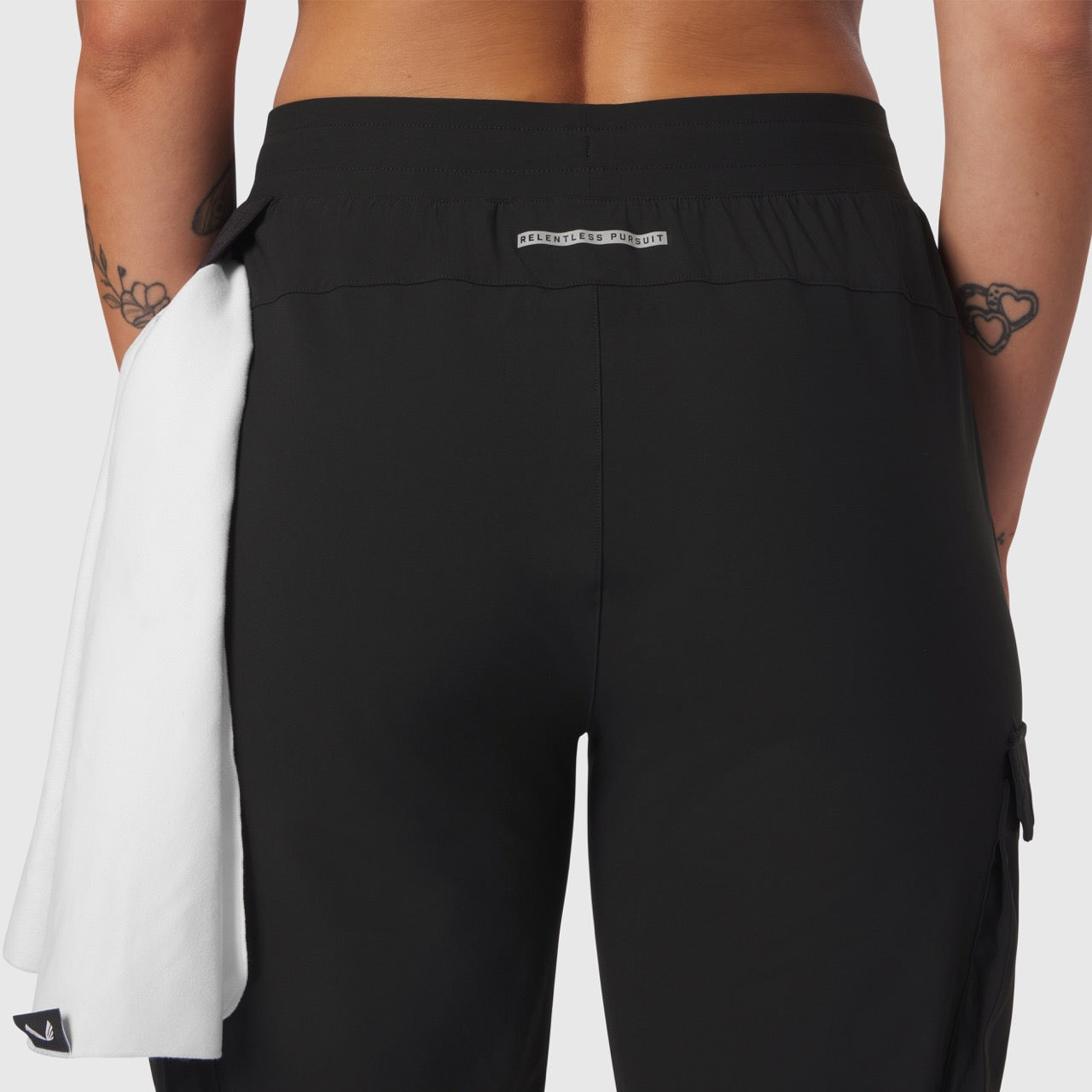 Tetra-Lite Cargo High Rib Jogger in black, back view on model with white towel