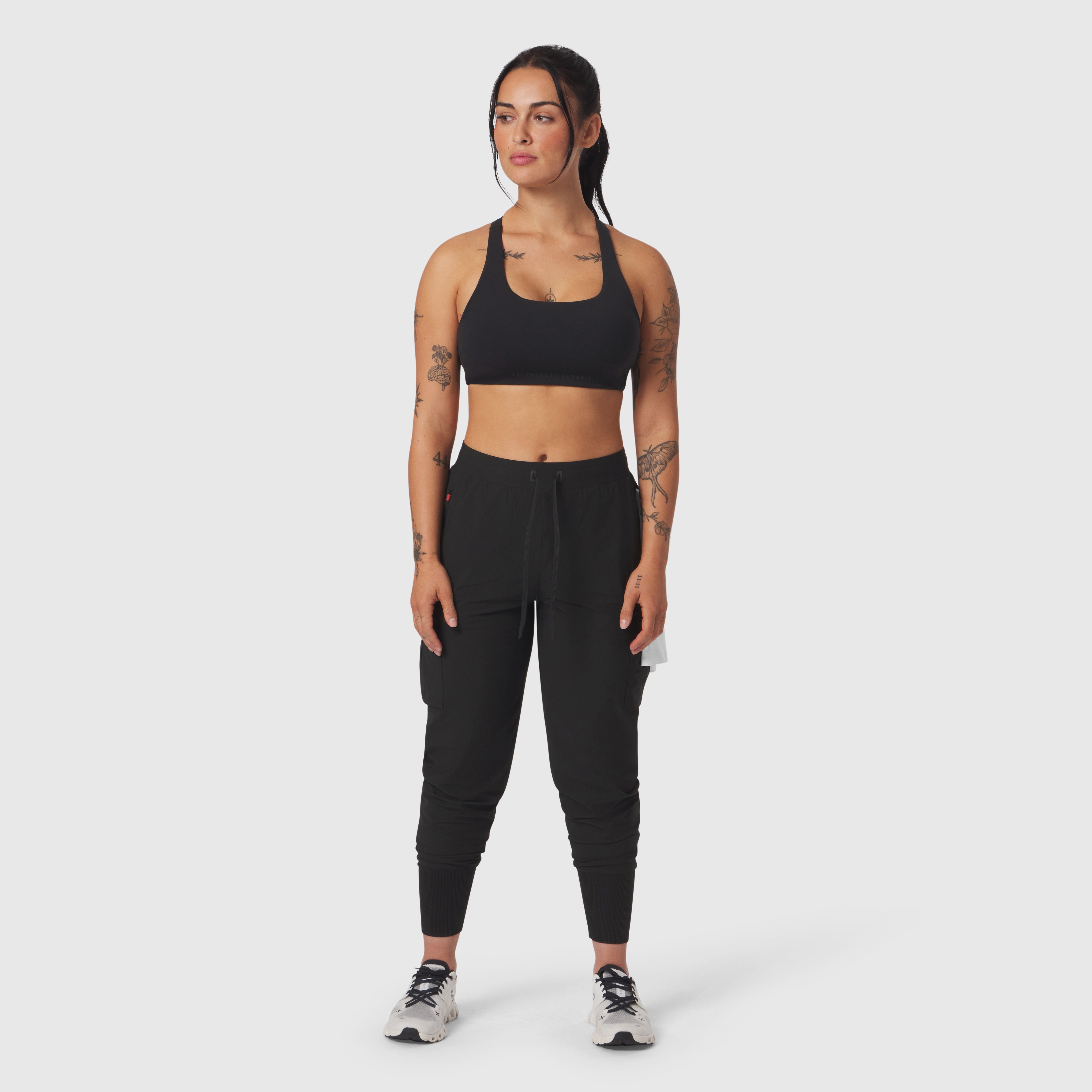 Tetra-Lite® Cargo High Rib Jogger in black, worn by model, front view