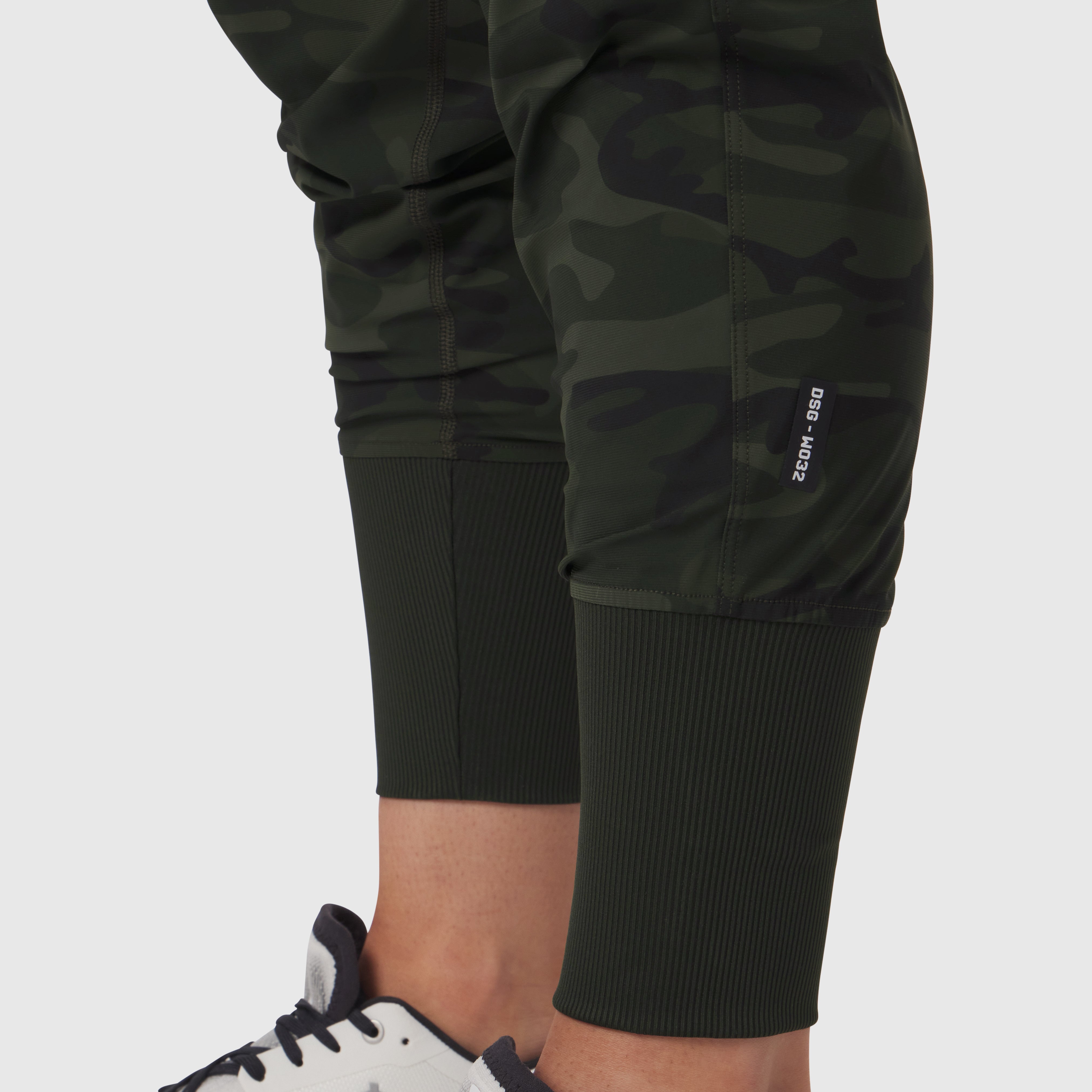 W032 Tetra-Lite® Cargo High Rib Jogger in dark camo worn by model, cropped leg detail
