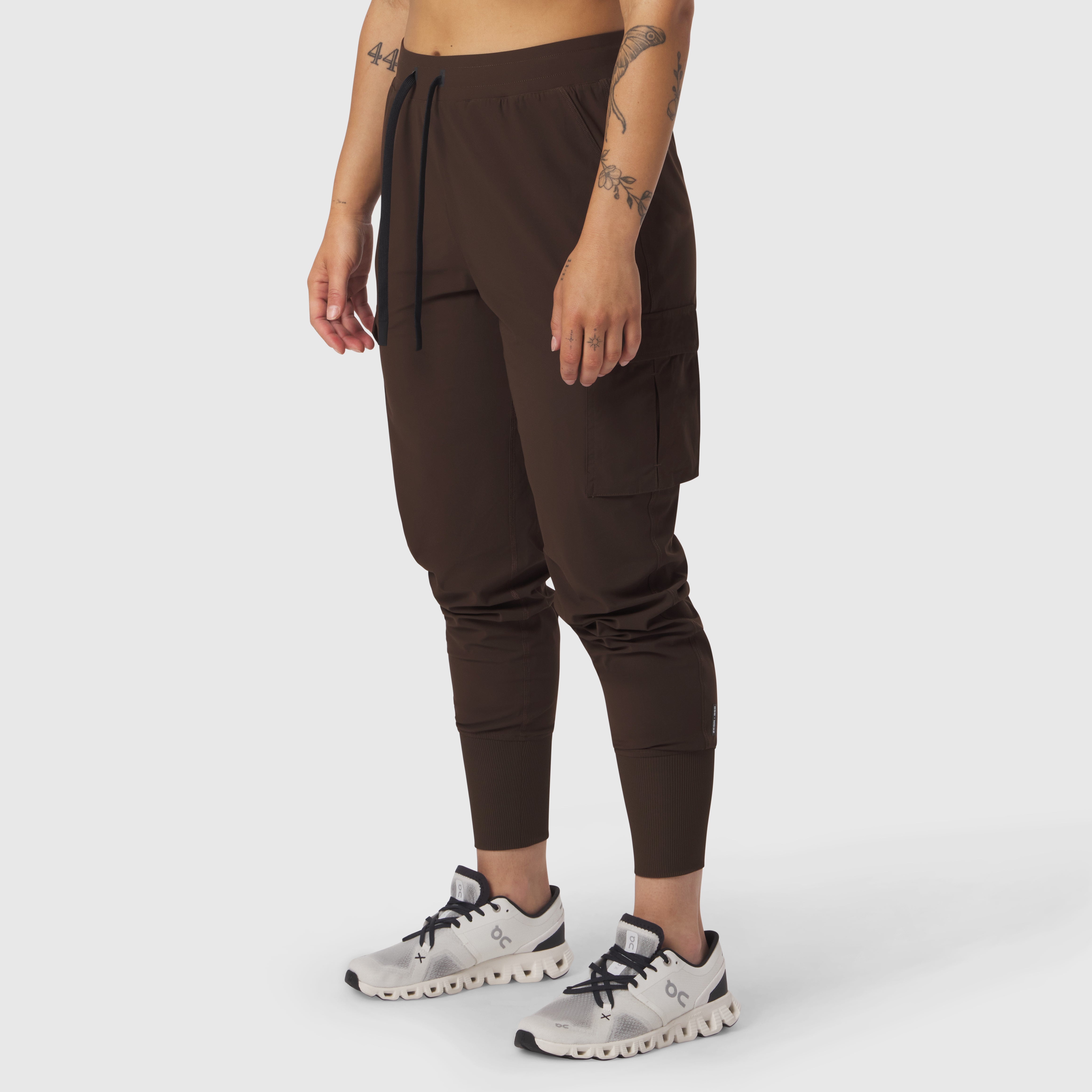 Tetra-Lite® Cargo High Rib Jogger in Dark Earth, worn with white sneakers, side view