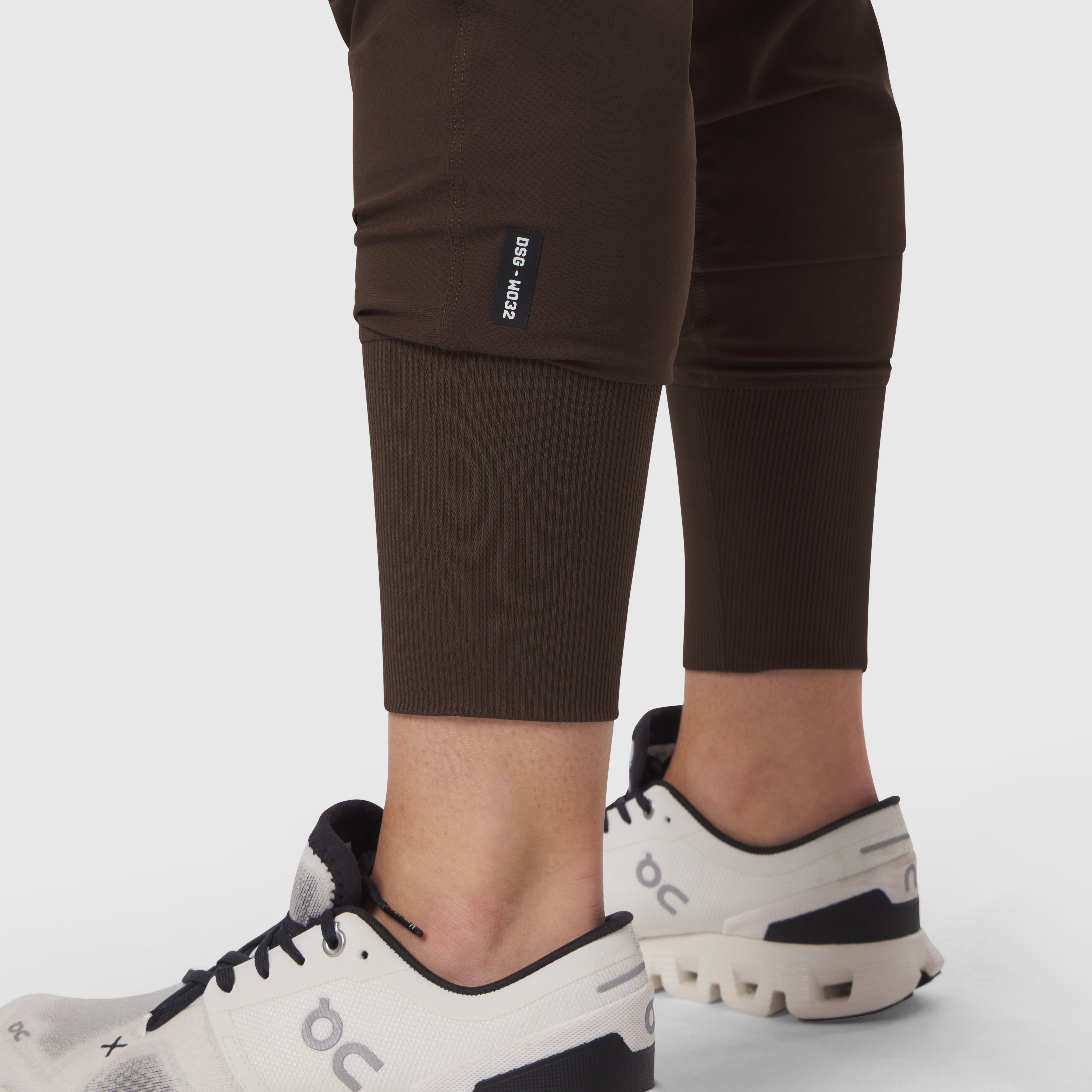 W032 Tetra-Lite Cargo High Rib Jogger in Dark Earth, worn with sneakers, lower body view
