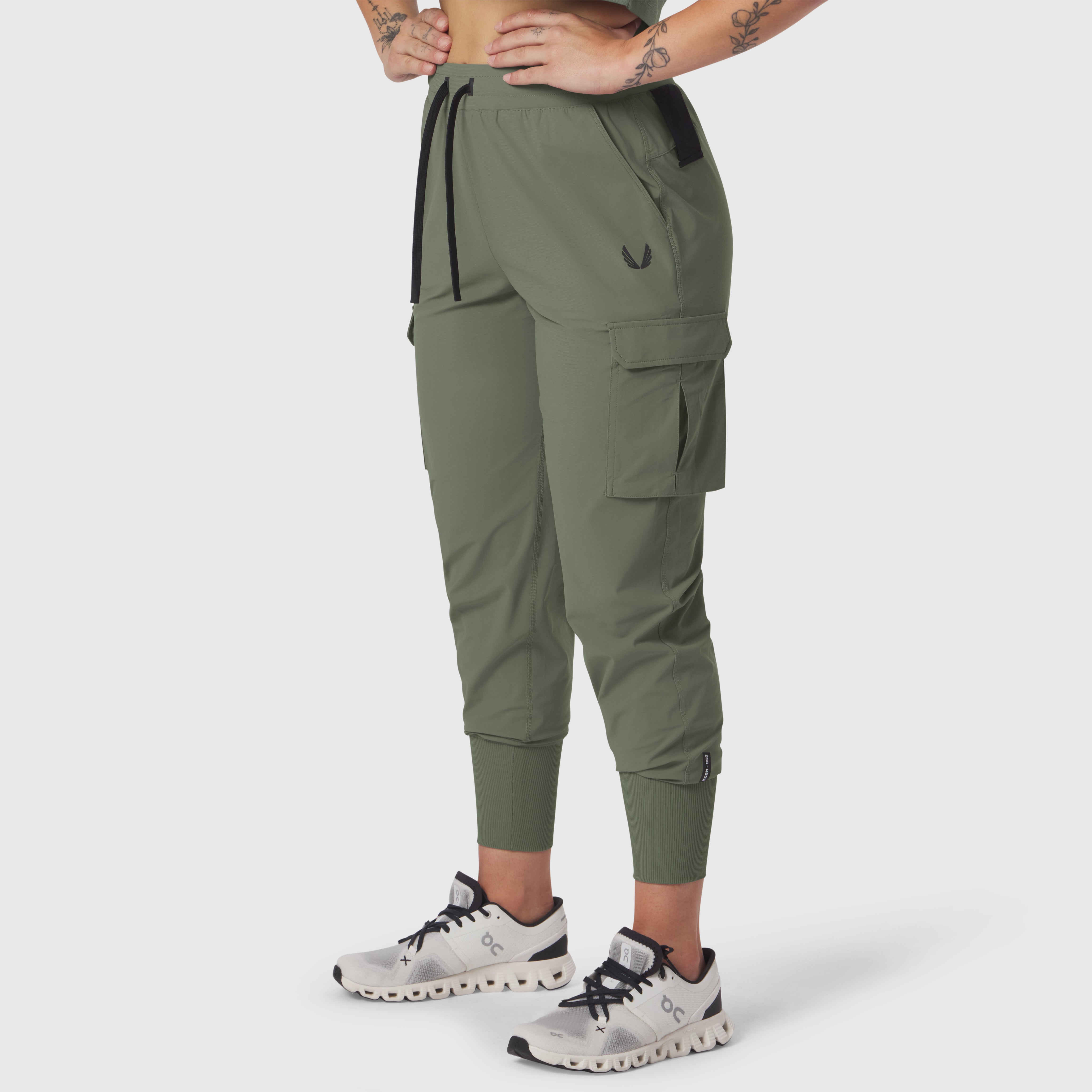 Tetra-Lite Cargo High Rib Jogger in sage, worn by model, front view