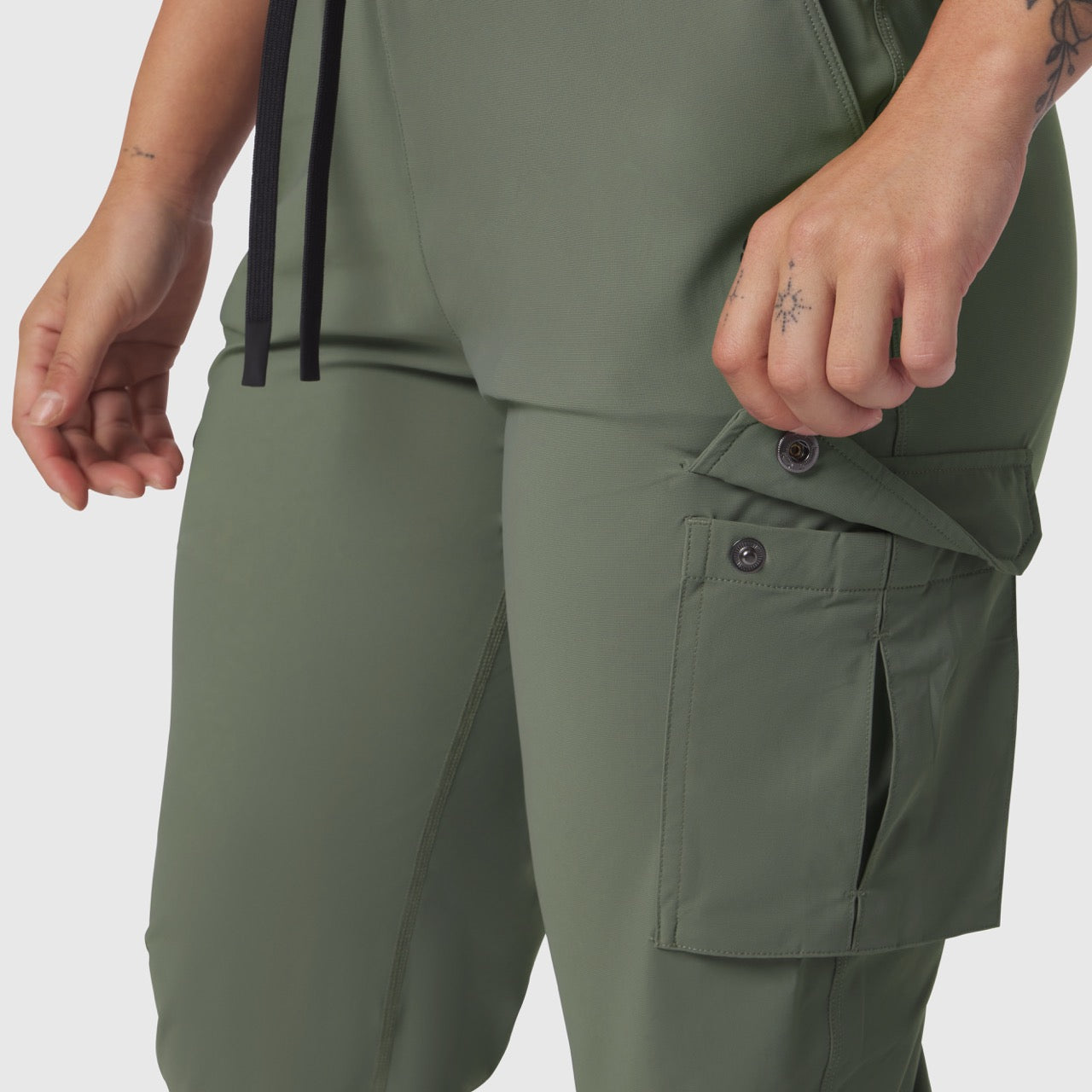 Tetra-Lite® Cargo High Rib Jogger in sage worn by model, detail view of cargo pocket
