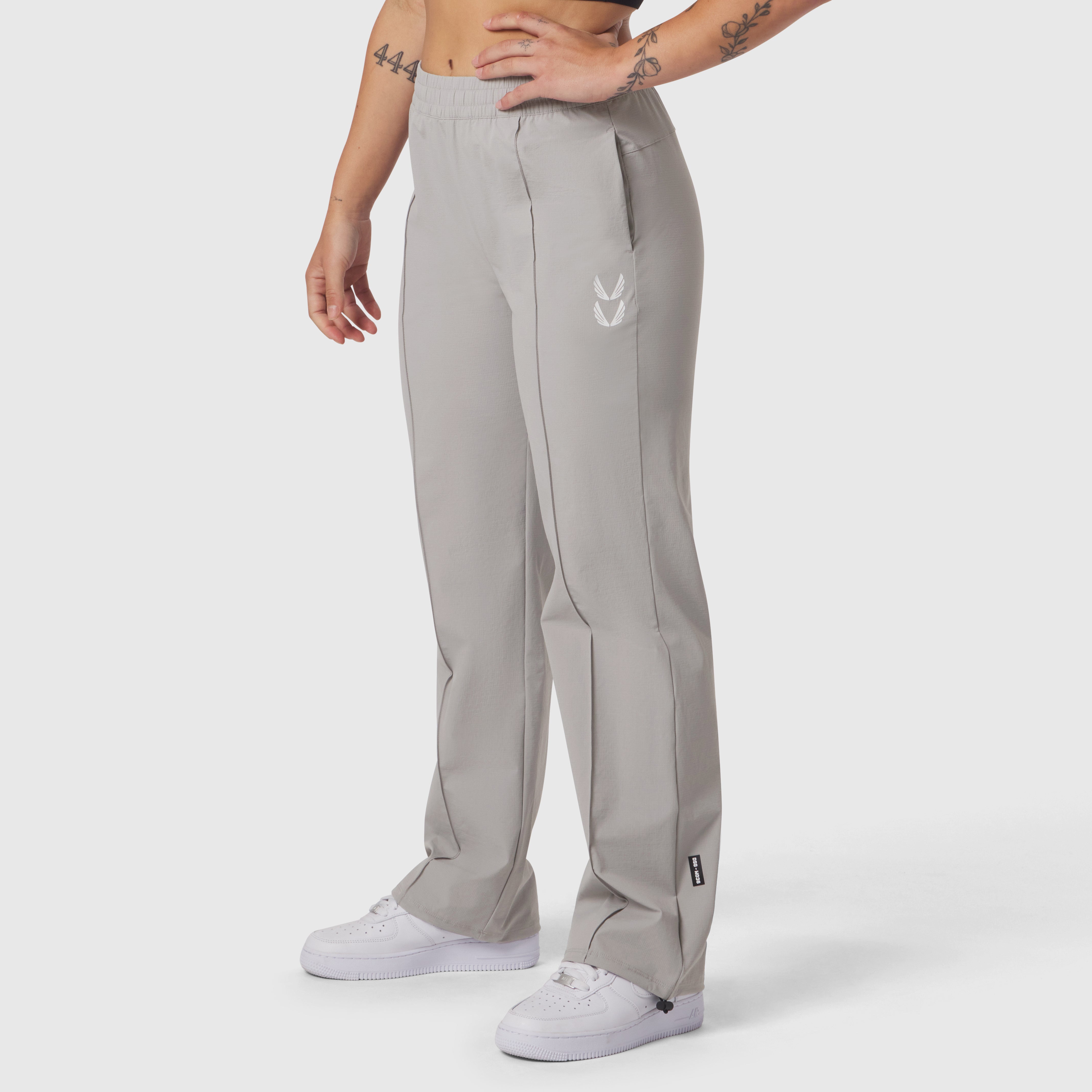 W036 Ripstop Relaxed Track Pant in slate grey, worn by model standing against white background