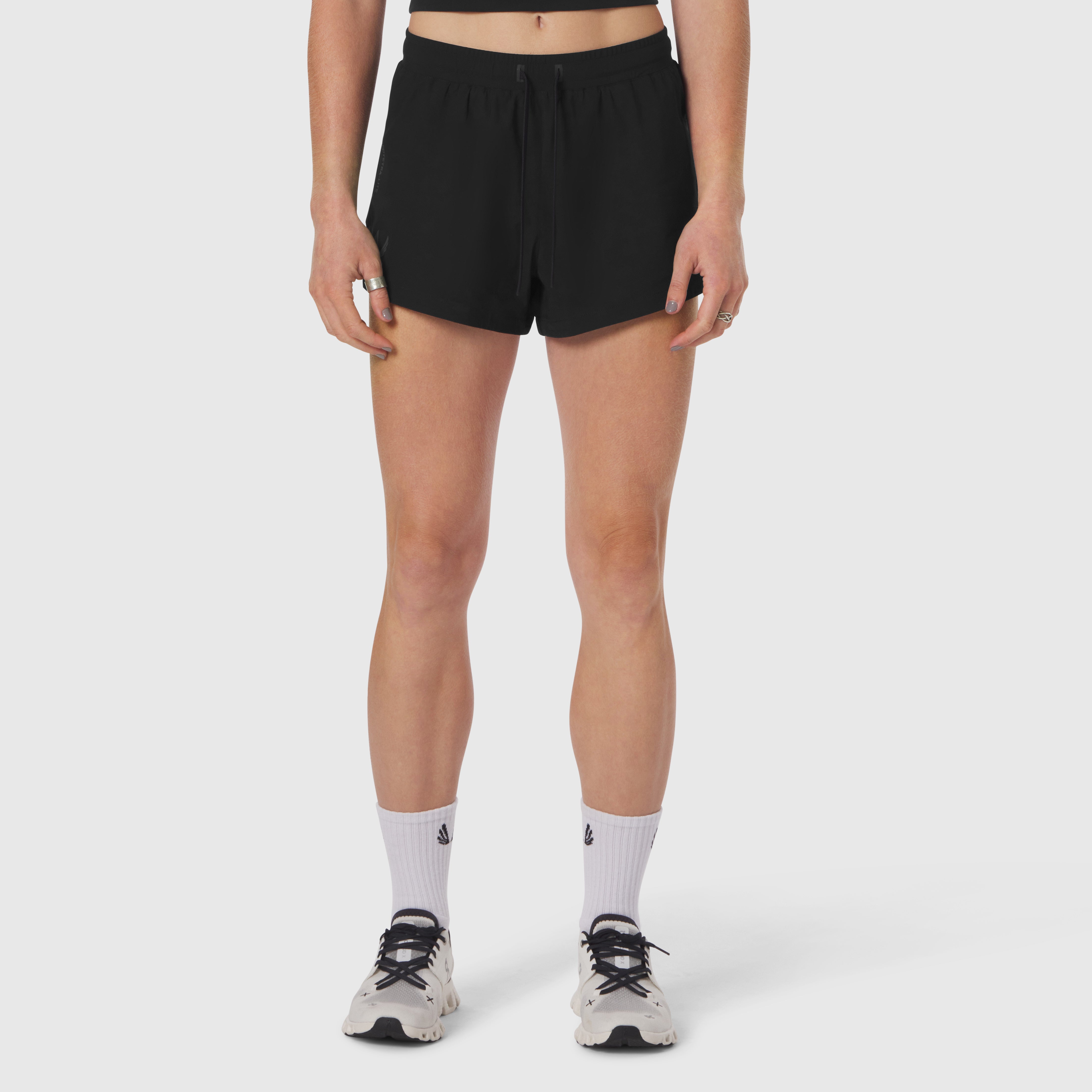 Black Tetra-Lite Linerless Short worn by model, front view