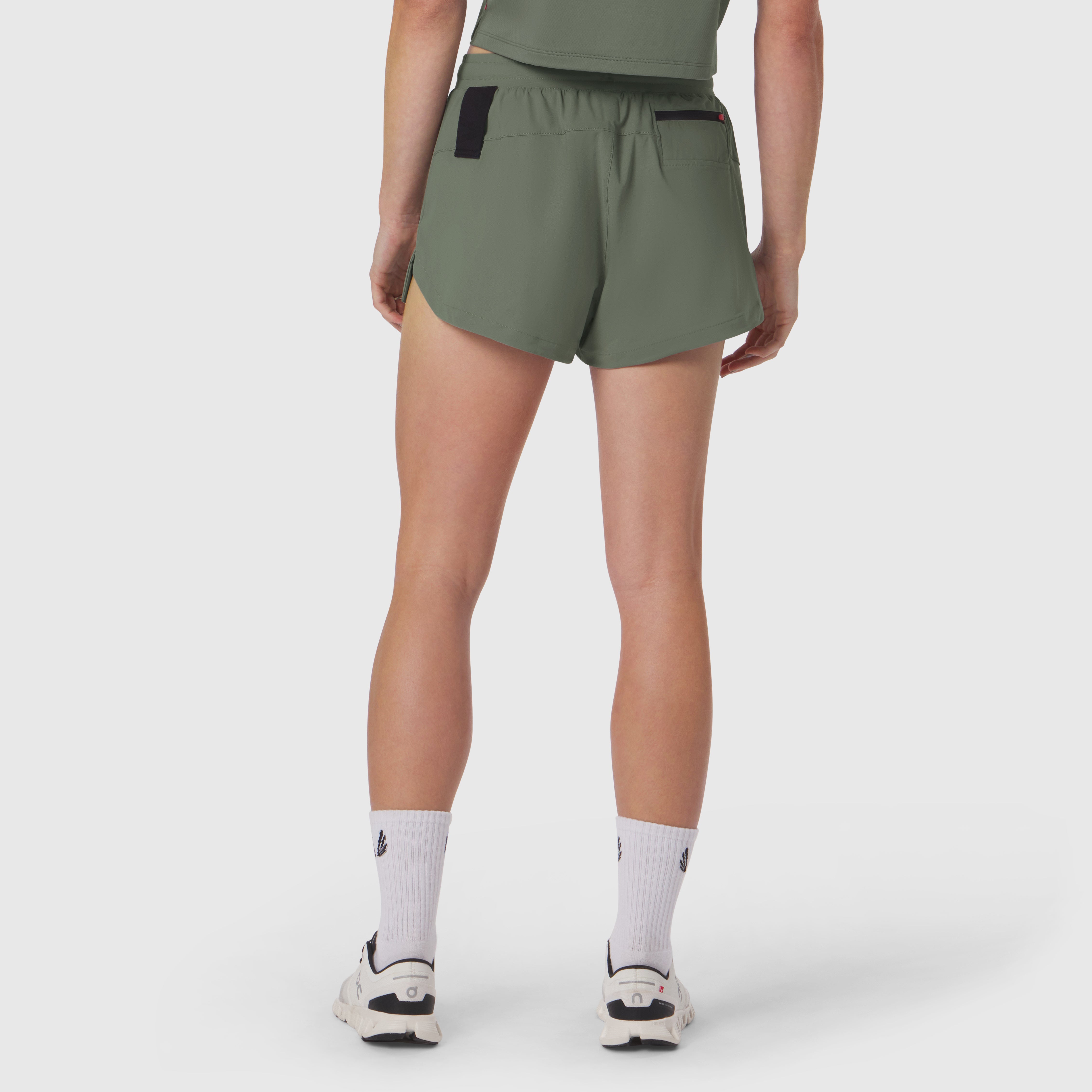 Tetra-Lite Linerless Short in sage worn by model, back view