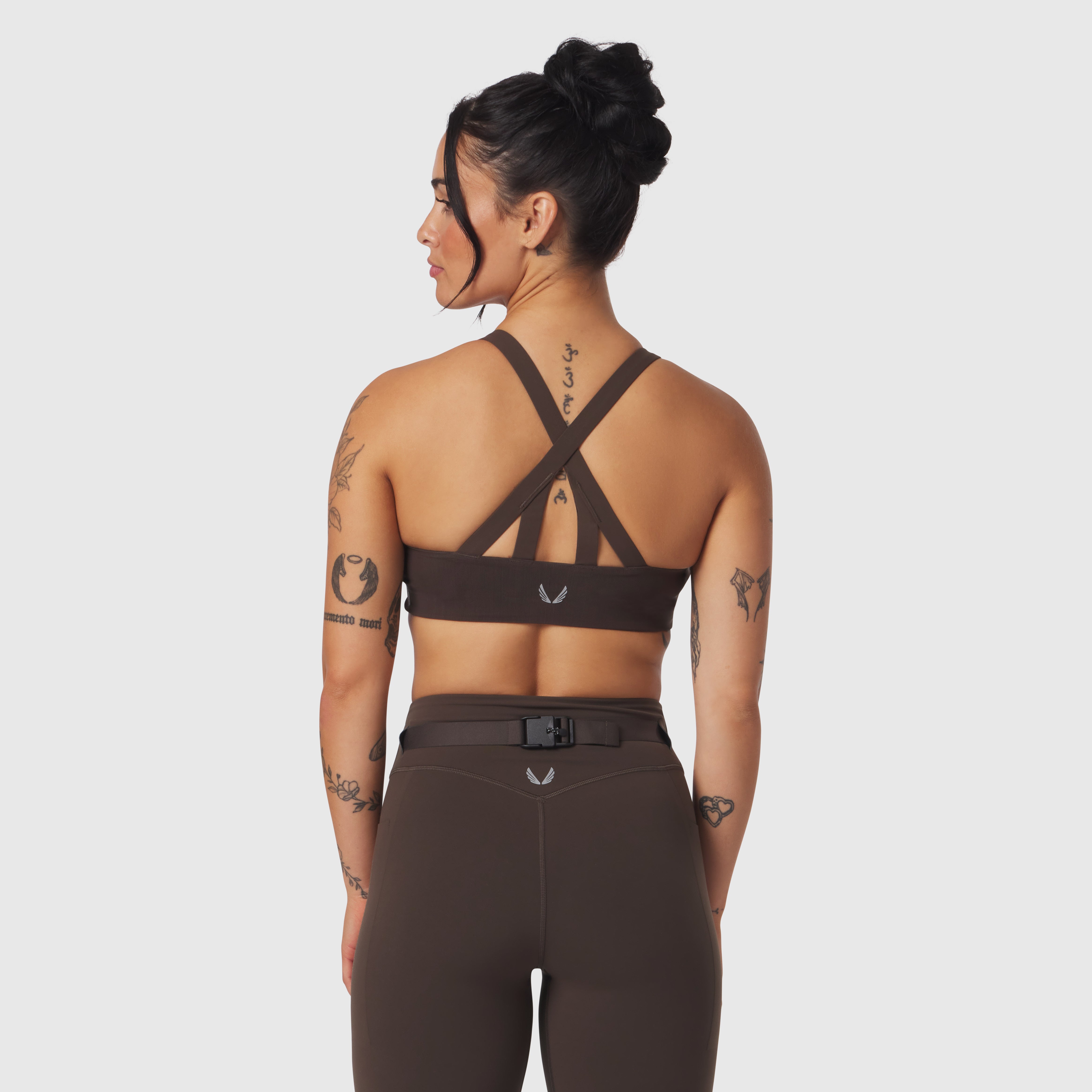 W039 Lycra Hybrid Sports Bra in dark earth, back view on model