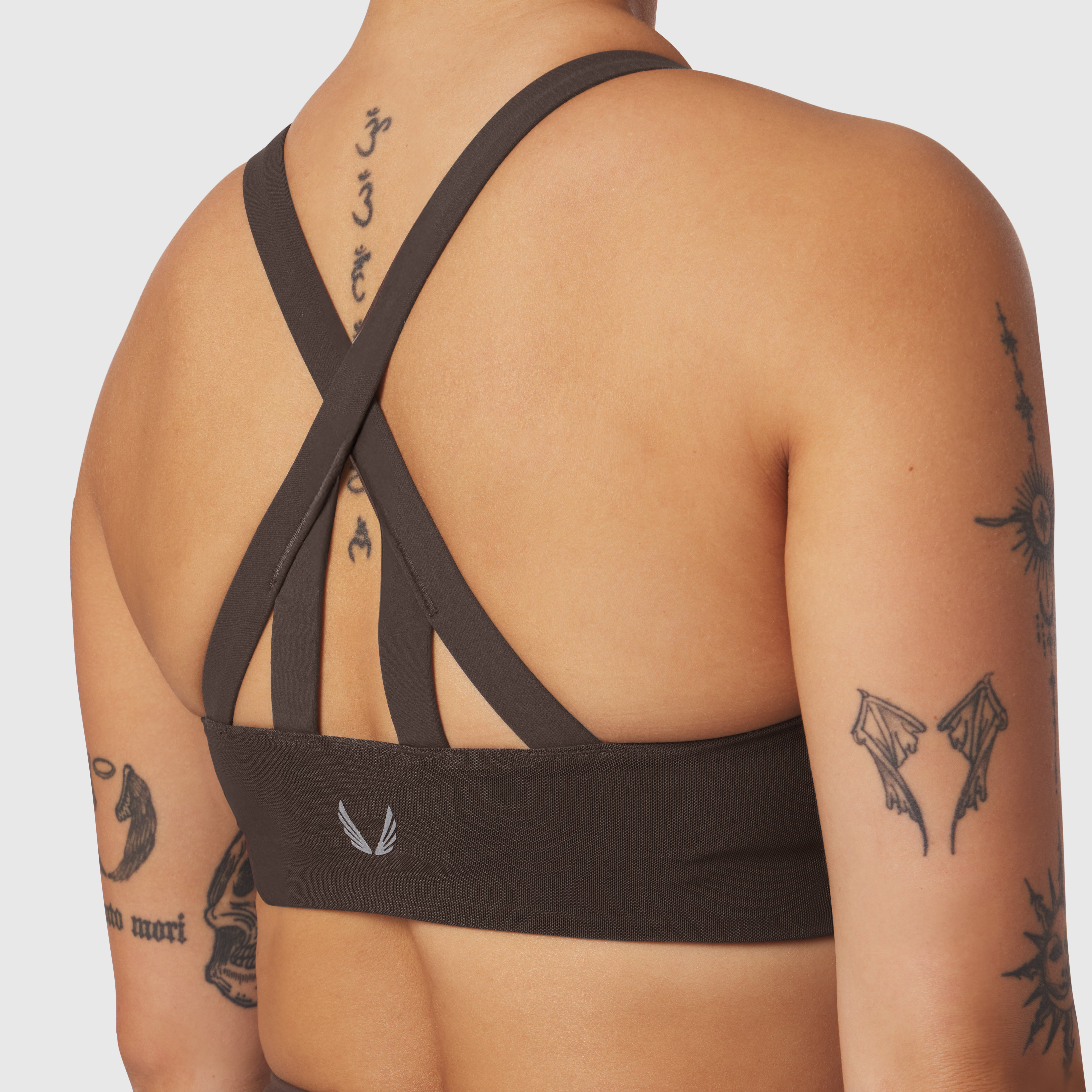Dark Earth Lycra Hybrid Sports Bra worn by model, back view showing cross-strap design