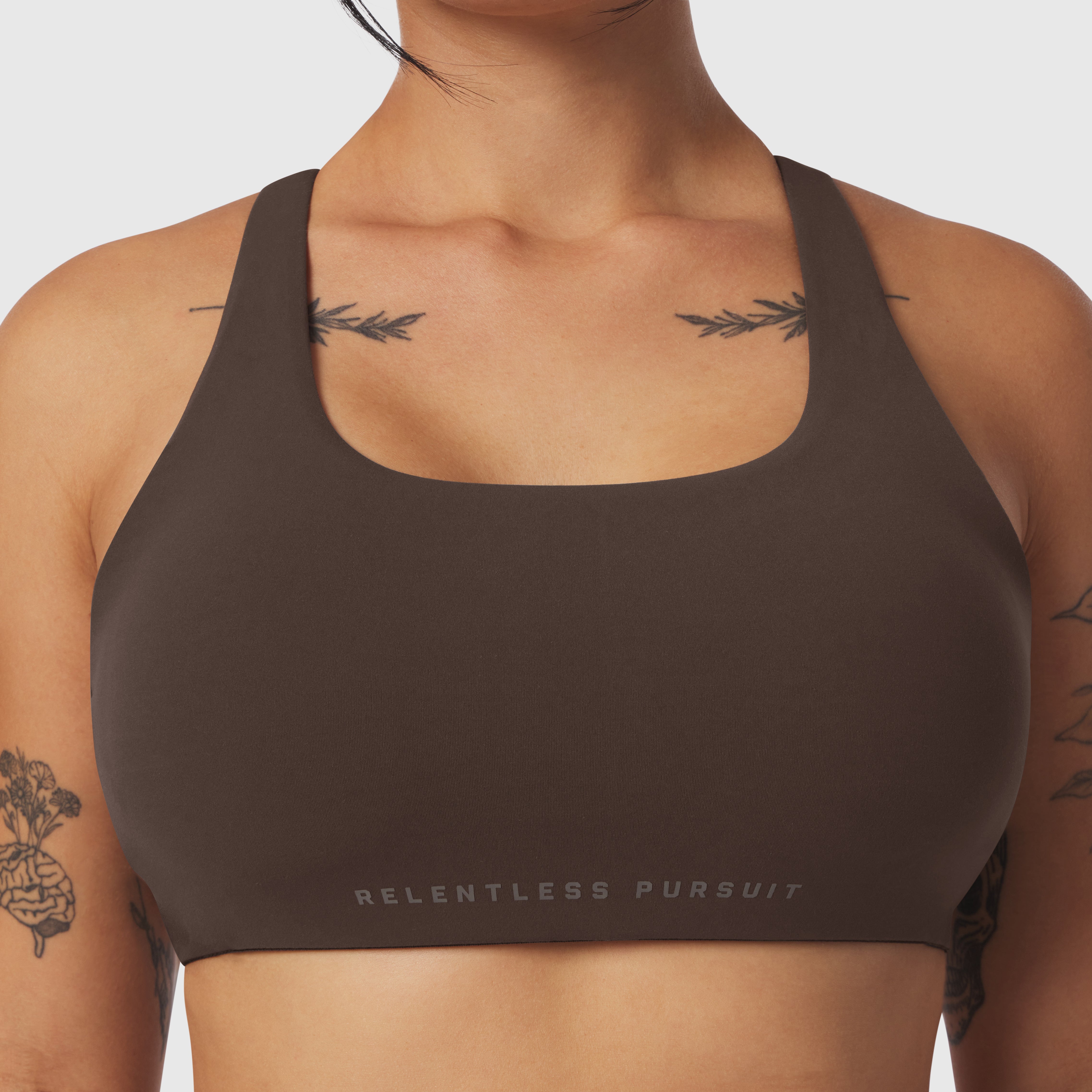 LYCRA® Hybrid Sports Bra in Dark Earth worn by model, front view