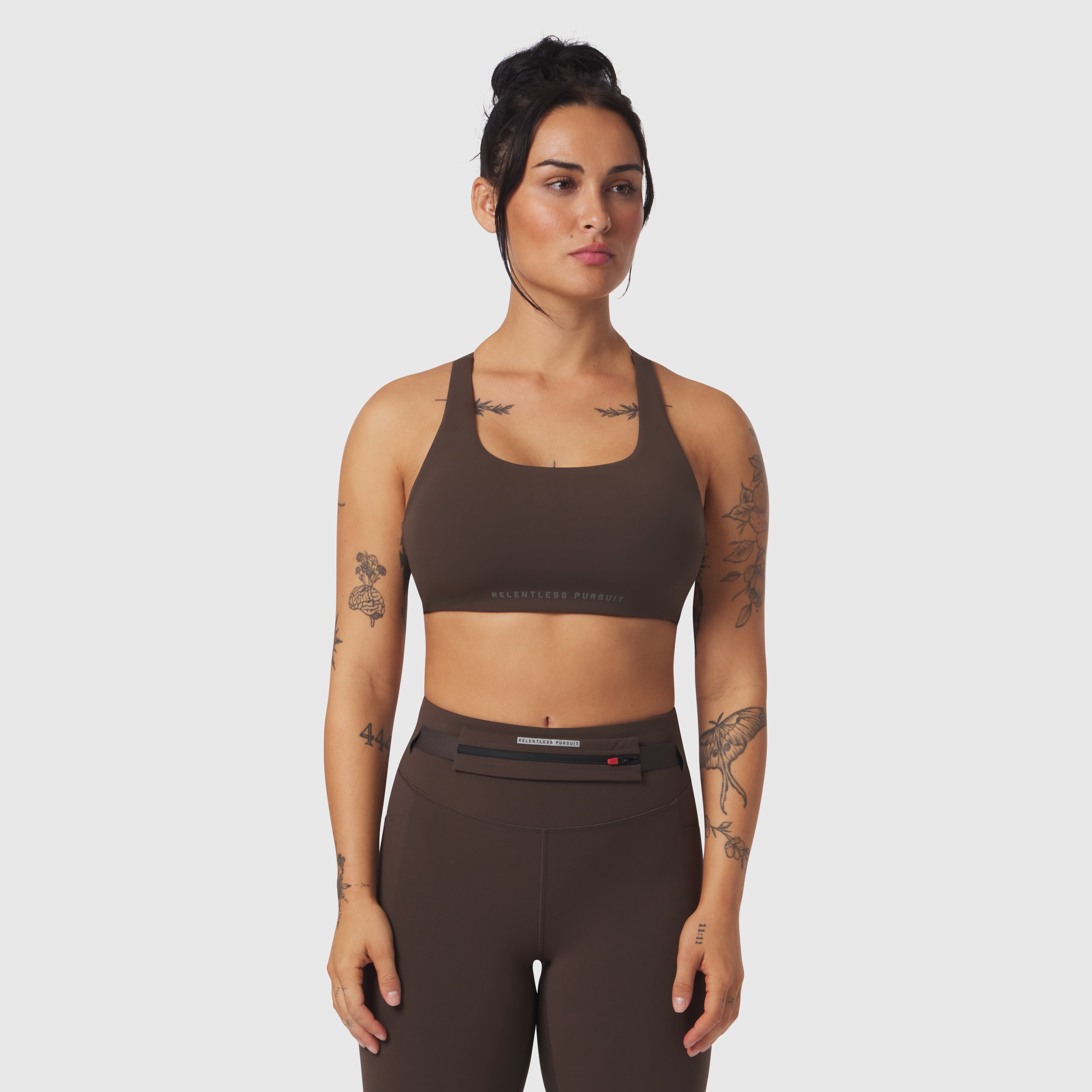 W039 Lycra Hybrid Sports Bra in dark earth, front view on model