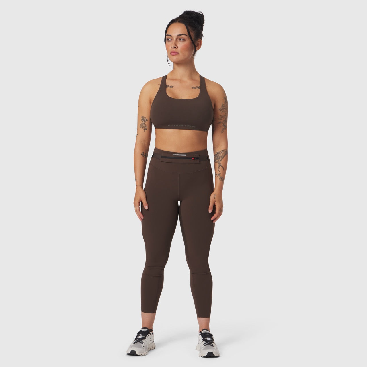 W039 Lycra Hybrid Sports Bra in dark earth, worn by model in matching leggings