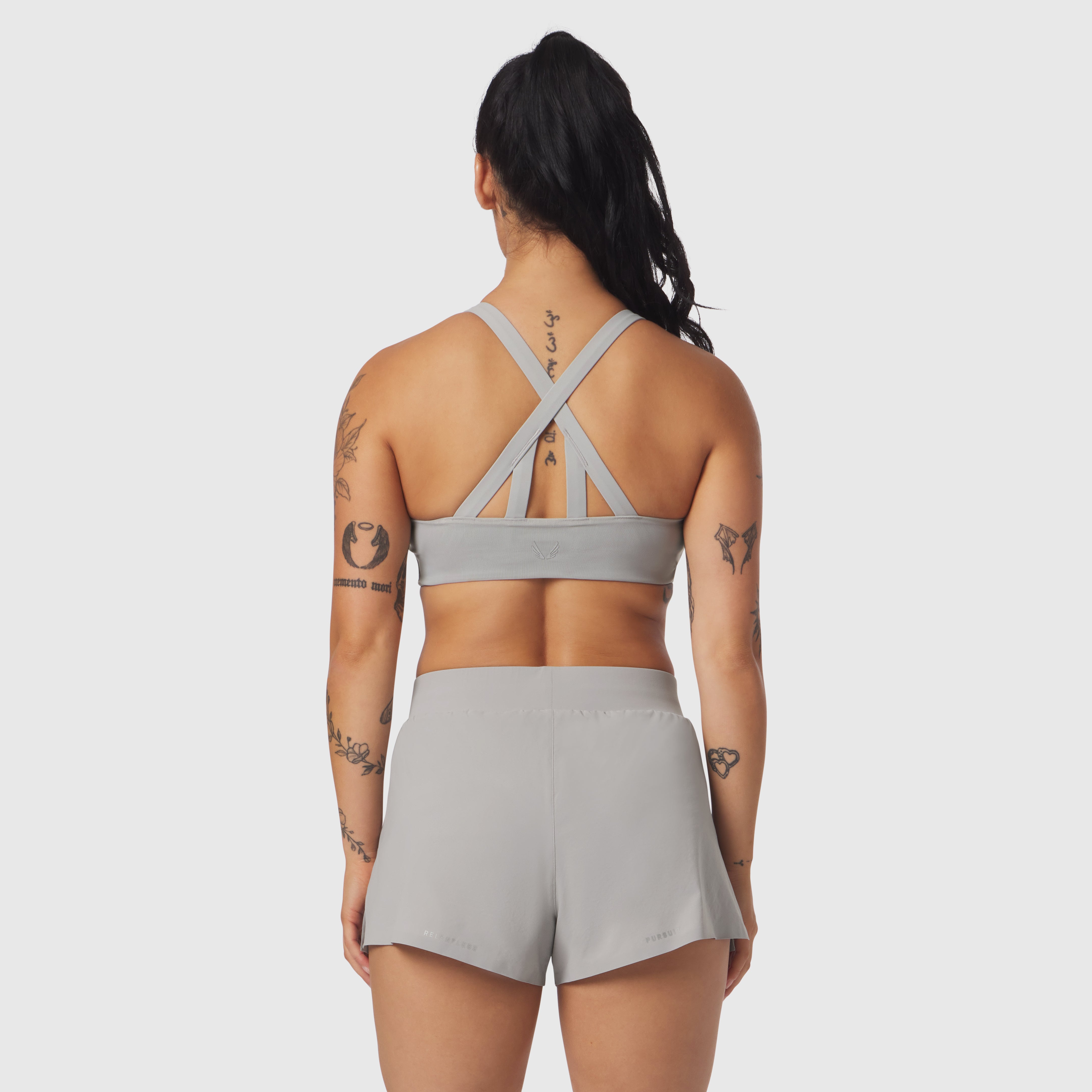 W039 Lycra Hybrid Sports Bra in slate grey, back view on model