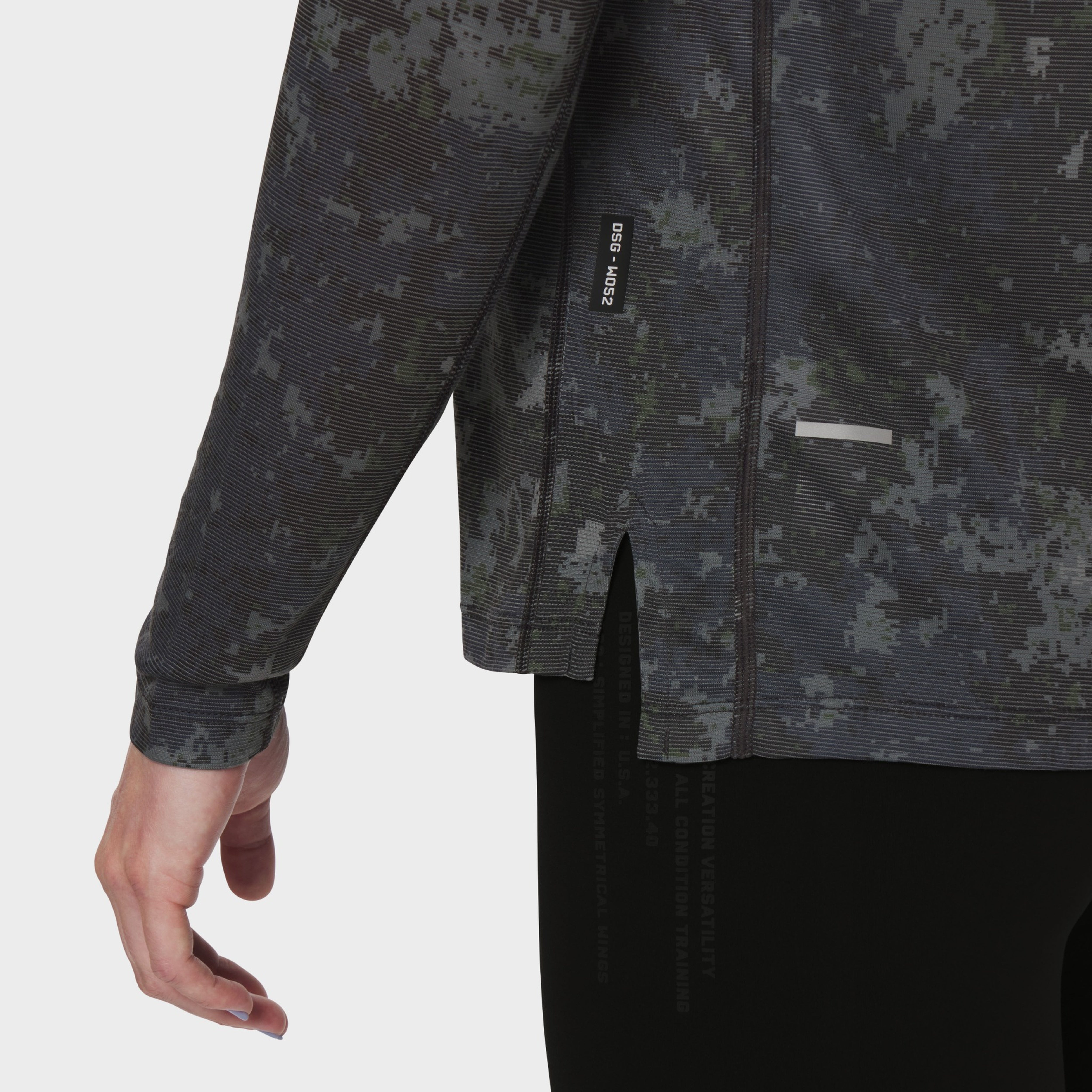 Polartec Delta longsleeve in pixel camo, model wearing detail shot