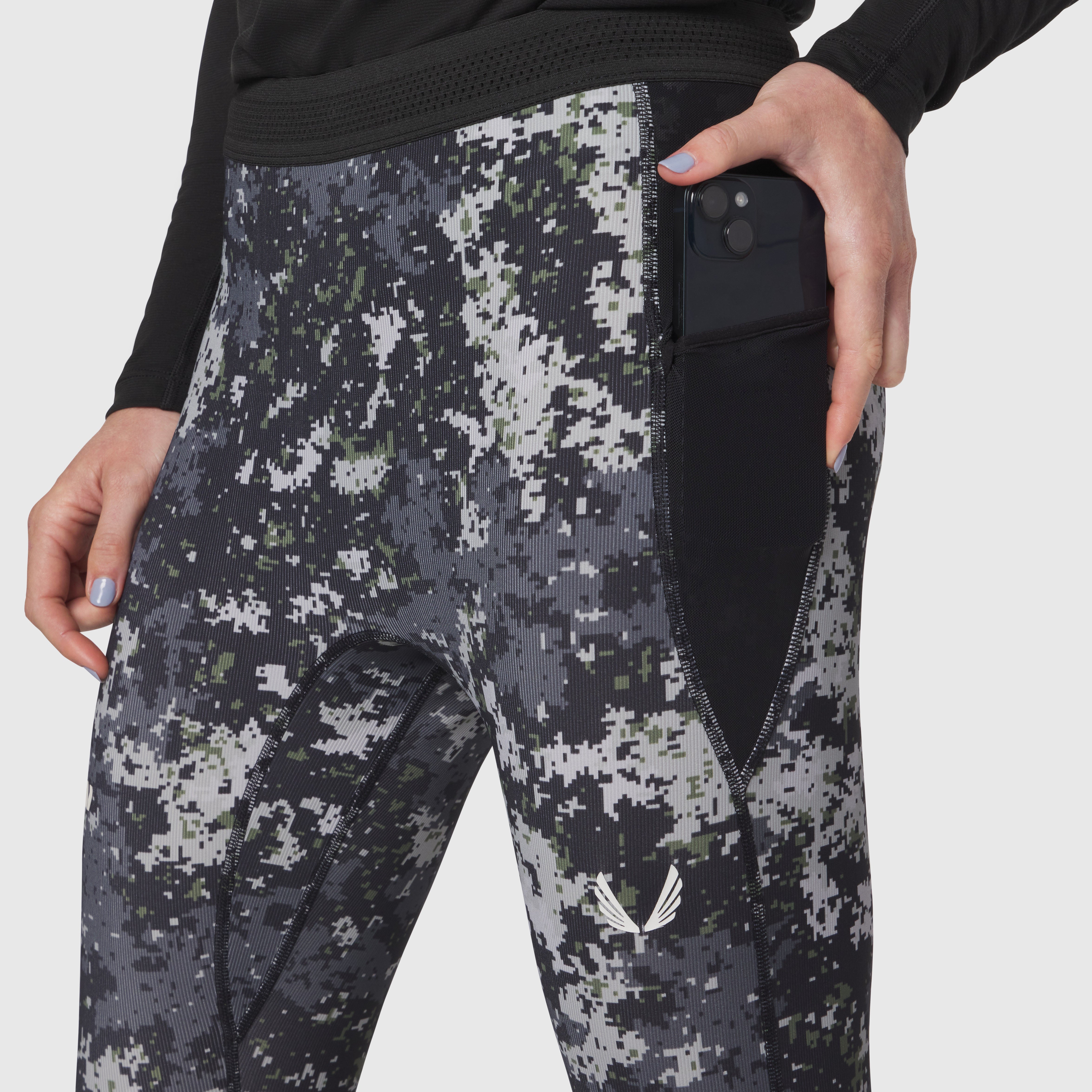 Lycra Ribbed Running Tight in pixel camo worn by model, side view with hand in pocket