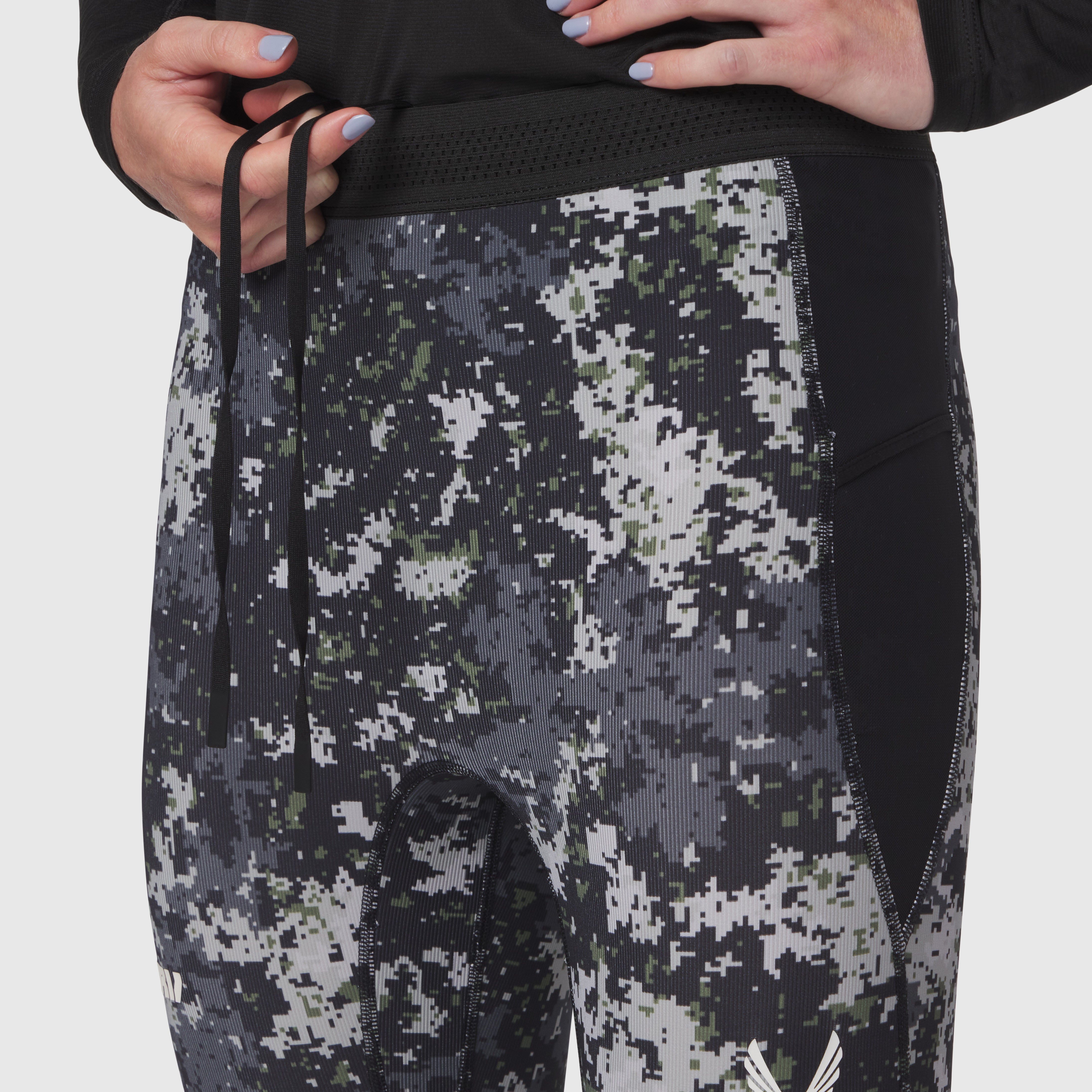Lycra Ribbed Running Tight in pixel camo worn by model, waist-down view
